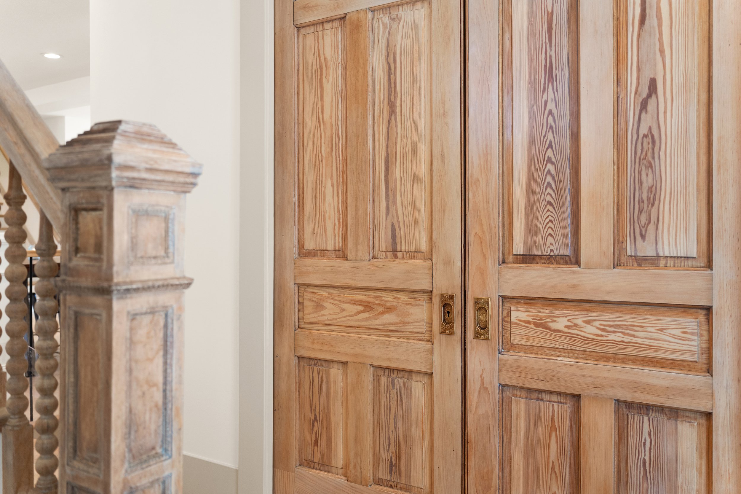 Restored original pocket doors preserved in whole home remodel Fort Thomas Kentucky by Shade Tree Homes