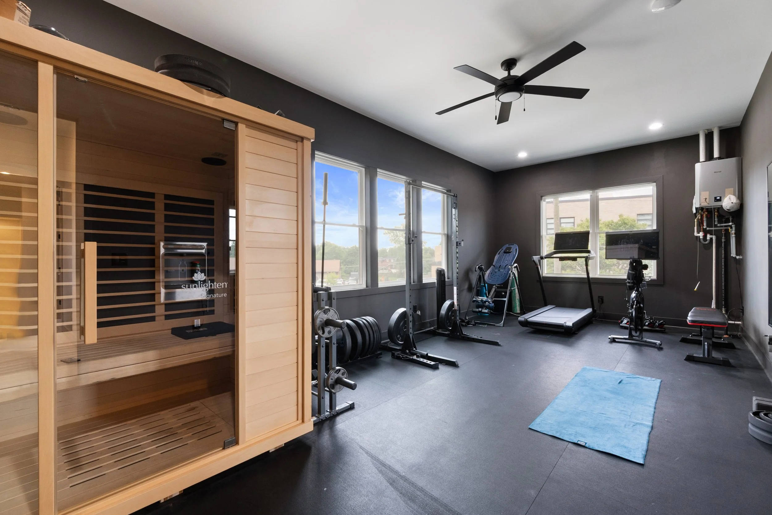 Custom home gym with sauna in Fort Thomas Kentucky whole home remodel by Shade Tree Homes