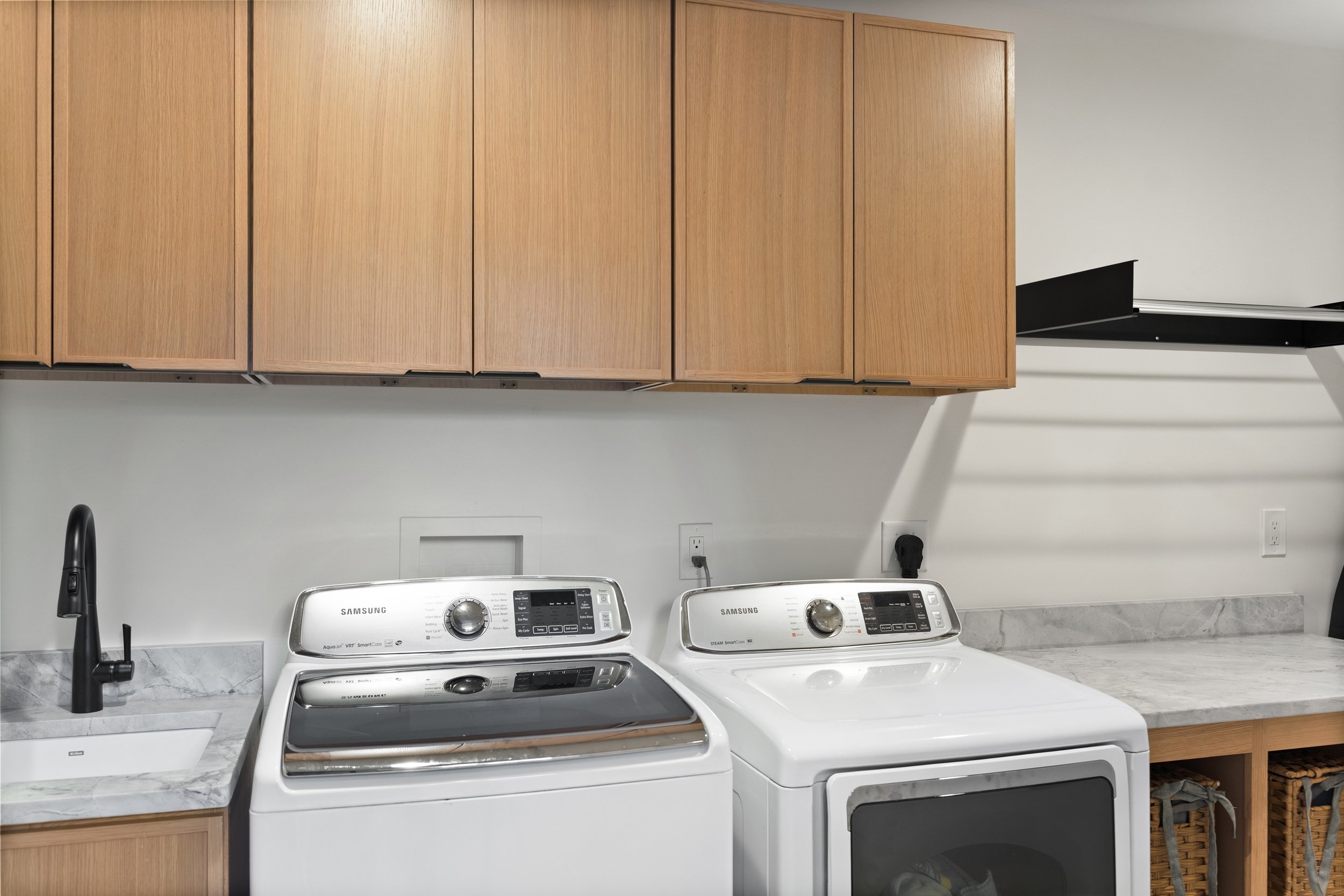 Custom laundry room in whole home remodel Fort Thomas Kentucky by Shade Tree Homes