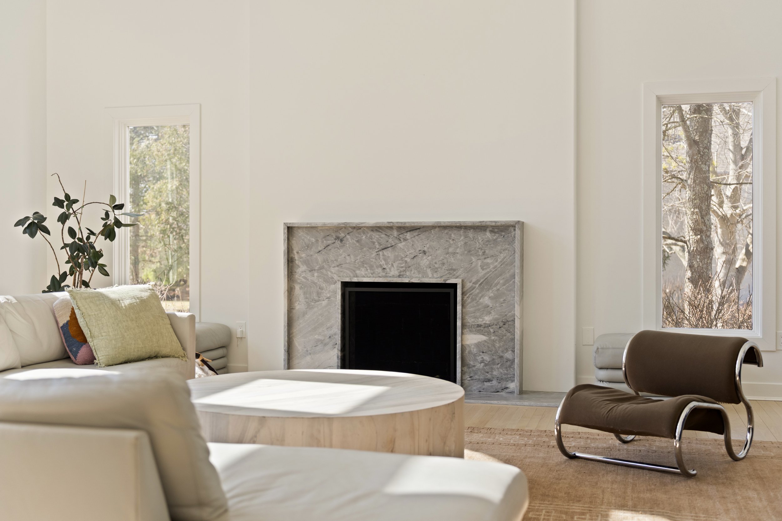 modern furniture Custom home living room designed around the homeowner in Northern Kentucky by Shade Tree Homes