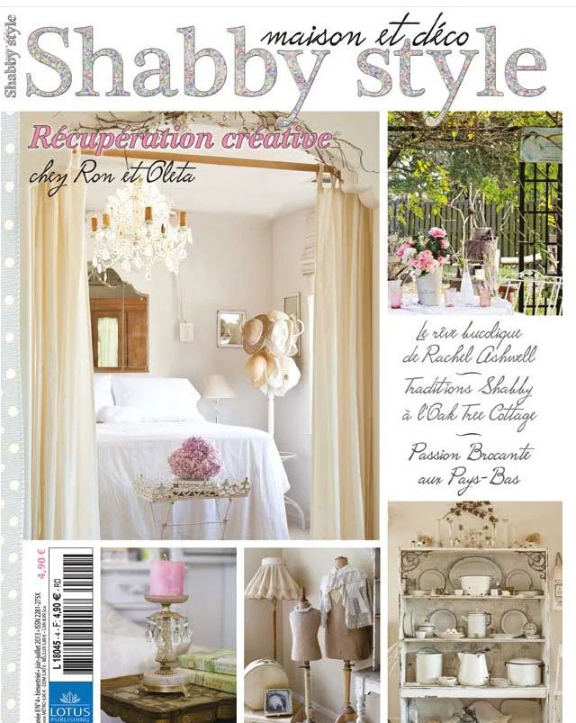 Cover of Shabby Style magazine featuring shabby chic home decor, including a bedroom with white curtains, chandelier, and soft pastel accents, as well as images of a garden table with flowers, vintage lamps, and white antique dishes.