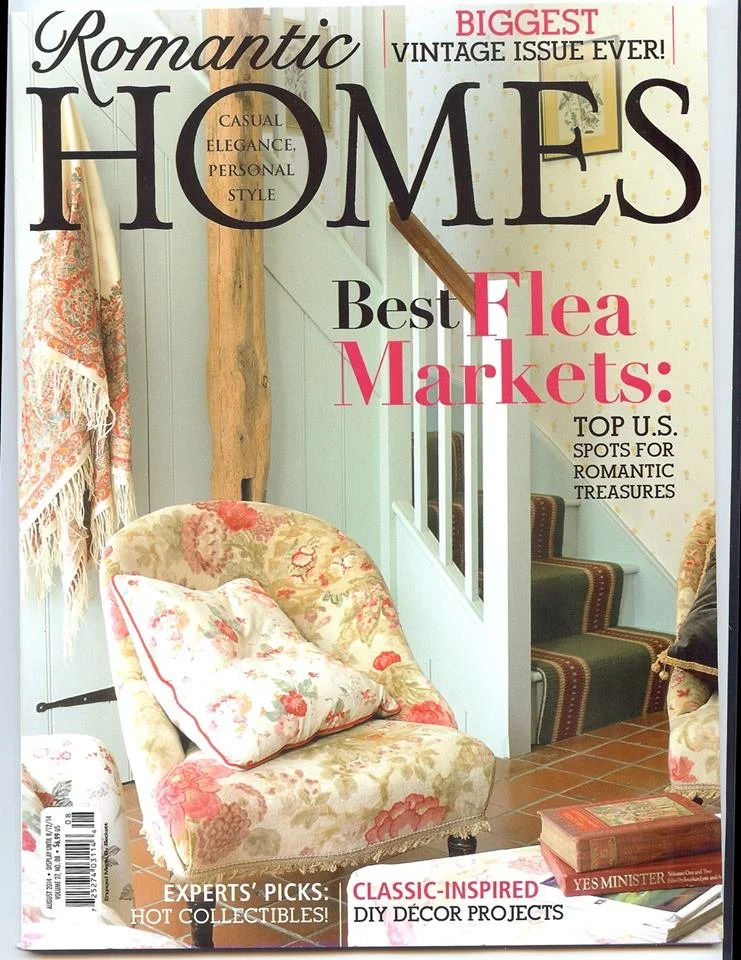 	
Artist and designer, Jo-Anne Coletti featured in A magazine cover titled "Romantic Homes" with a subtitle about heart-filled decorating. The title highlights 'Romantic Homes' with features on flea markets and DIY decor projects.