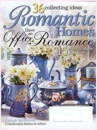 Cover of a magazine titled 'Romantic Homes' featuring a blue floral table setting with flowers, teapots, and cups, emphasizing romantic home decor ideas.