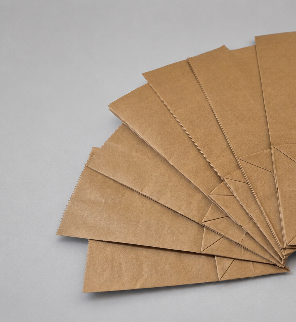 All types and sizes of Paper Bags Available, Paper Bags for your retail store, and also, Paper Monocardboard Liquor Holder - 6 Pack -- Made to Order with Full Customization.