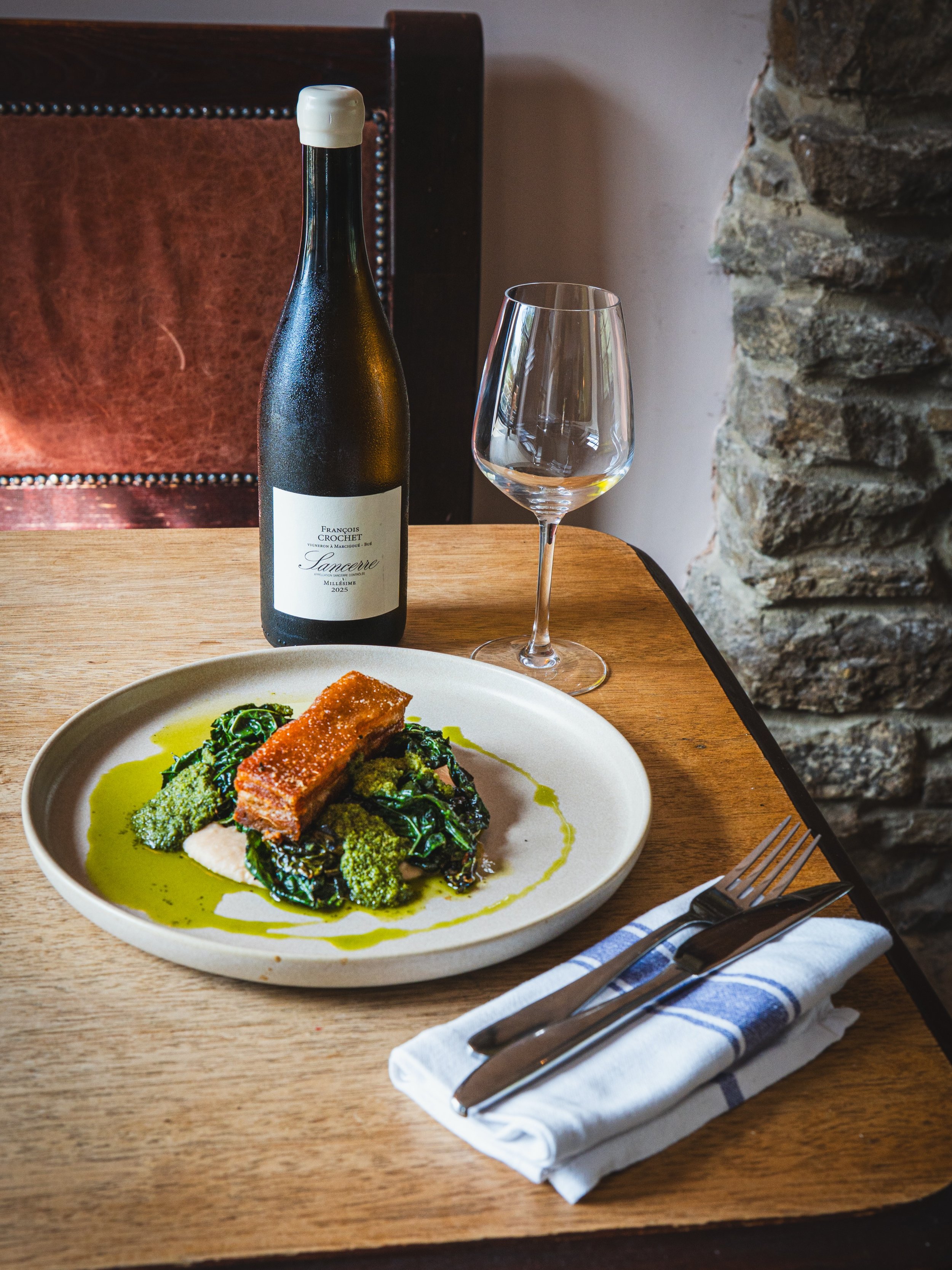 This is what autumn eating looks like. Pork belly on a smooth white bean pur&eacute;e, with cavolo nero and a punchy salsa verde to bring it all together. Hearty without being heavy, and gluten free. Book a table and come and try it.