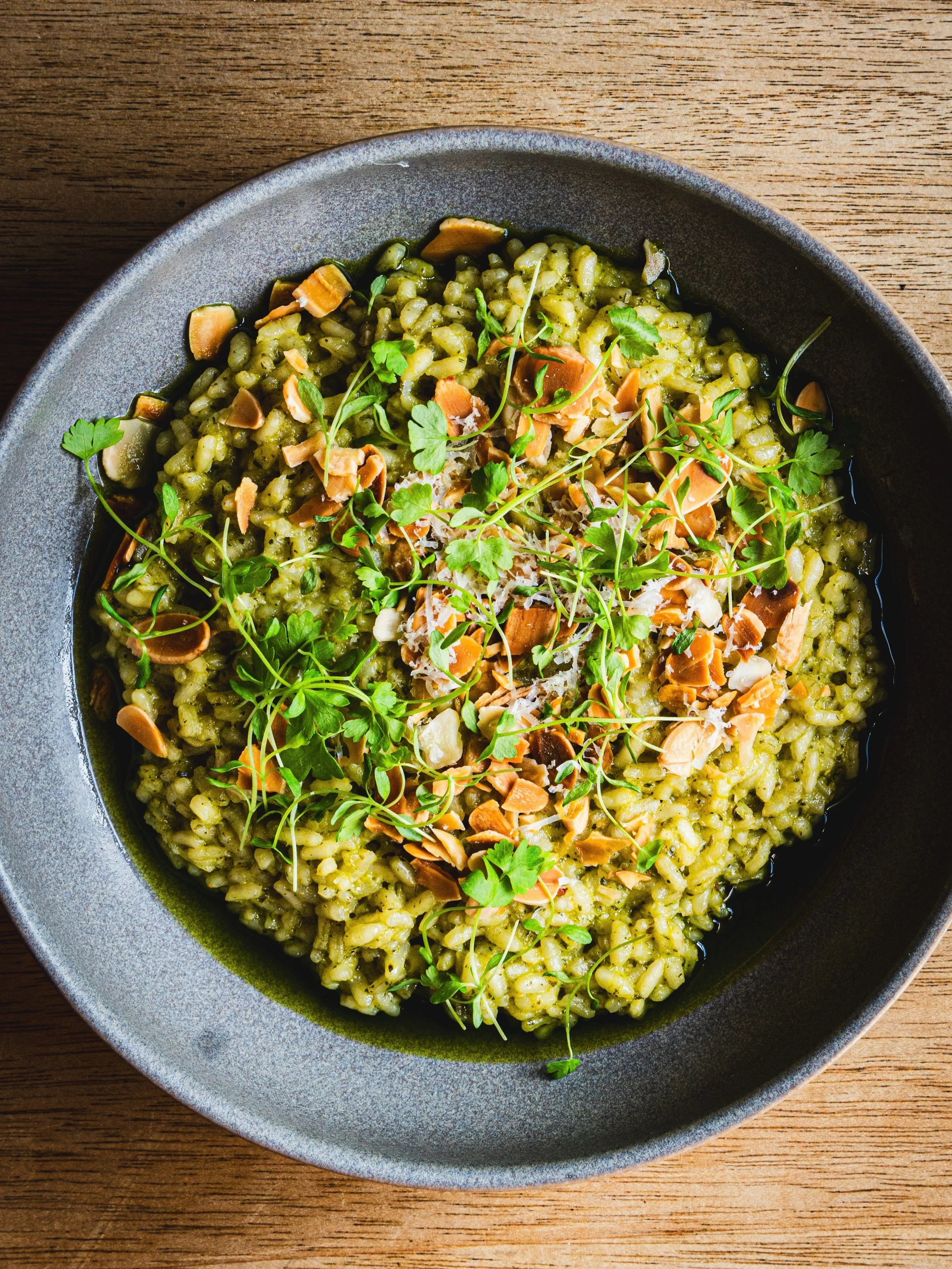 Risotto and a glass of white. Is there a better way to end a Monday?

Our almond, thyme &amp; garlic risotto is rich, garlicky and topped with toasted almonds and parmesan. Come and find out for yourself.