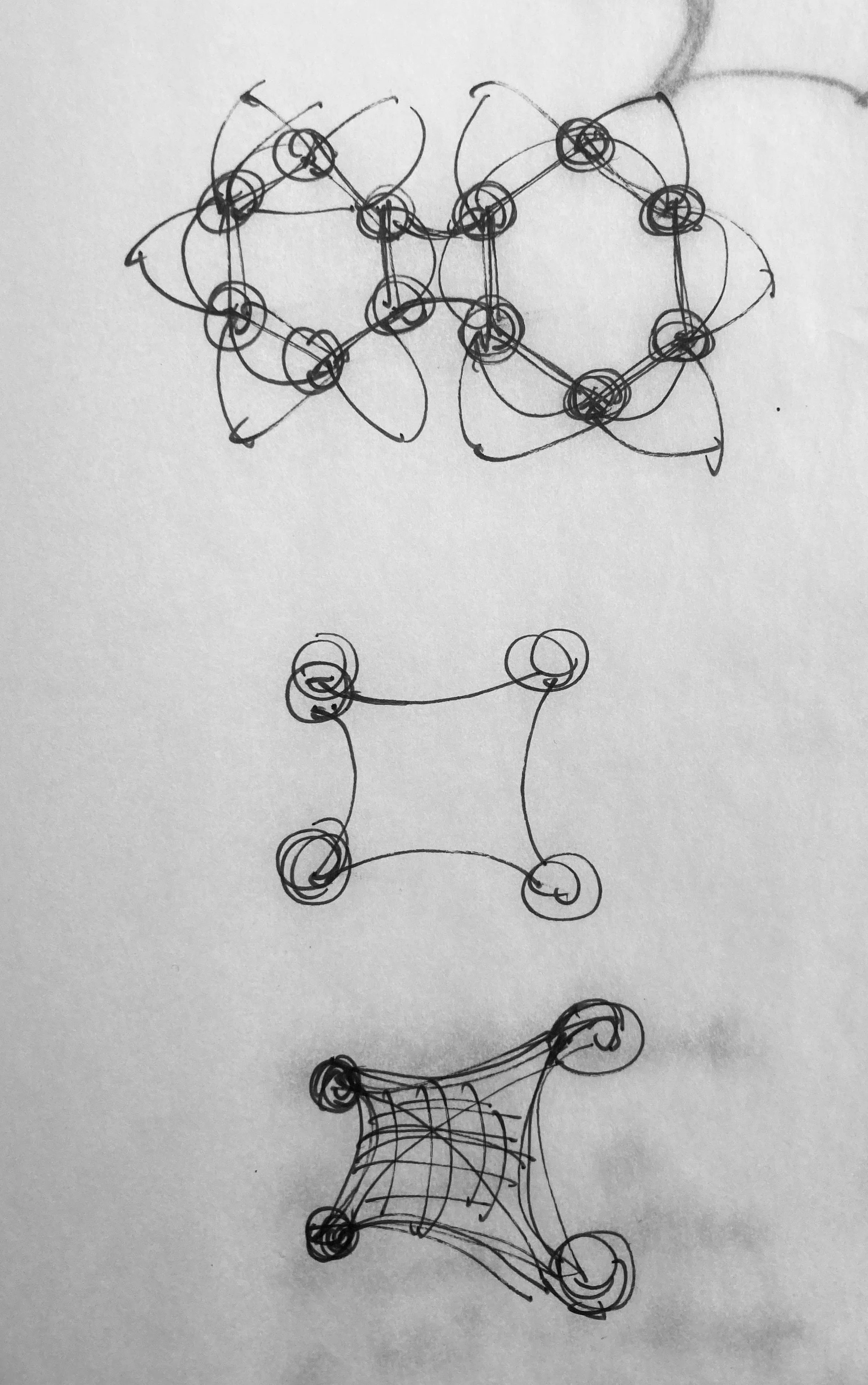 Architectural sketch resembling a molecule with interconnected rings and atoms, shown with multiple circular nodes and lines connecting them.