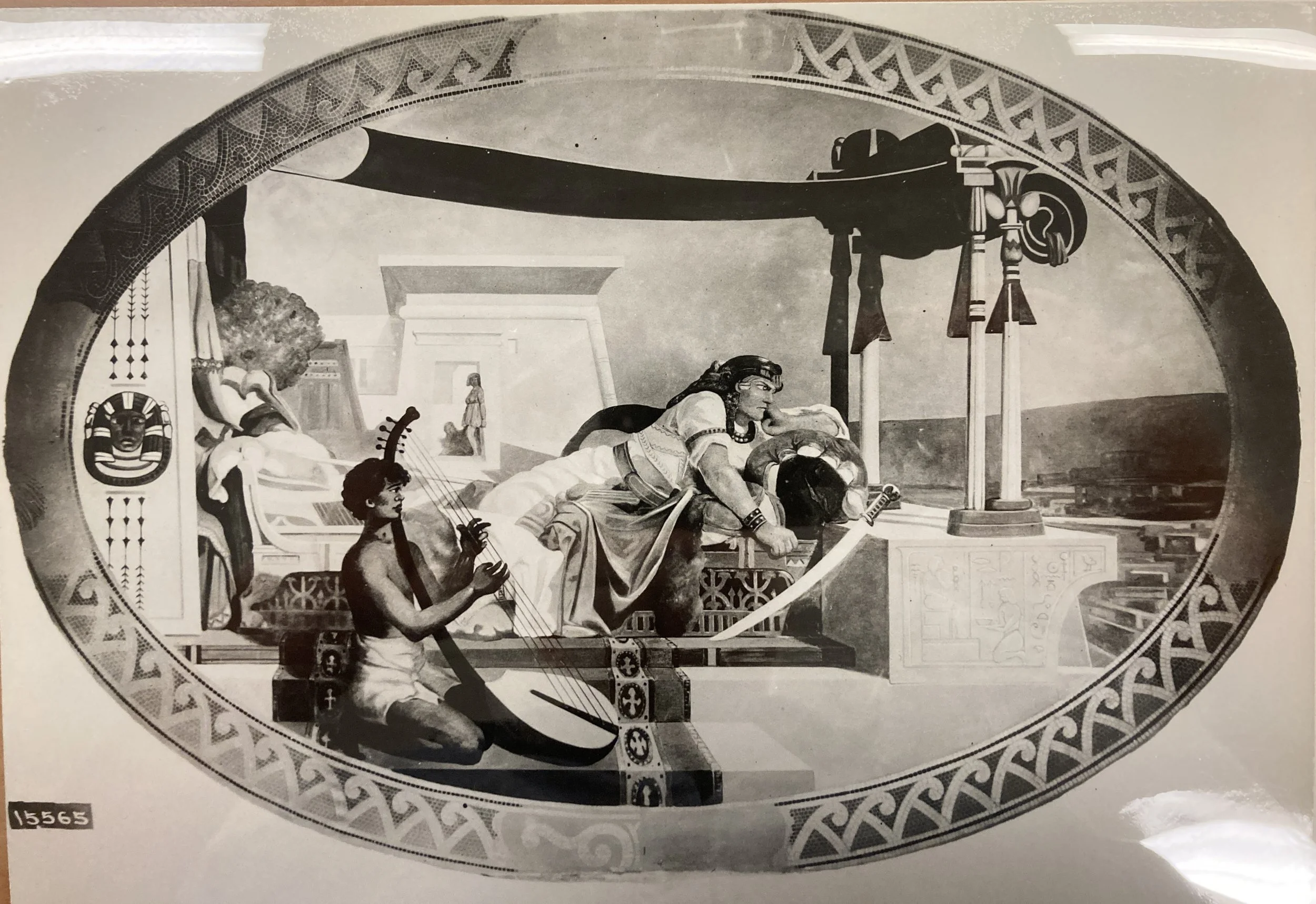 An ancient Egyptian-style mural depicting a seated woman with a headdress, a small boy playing a harp, and other figures in the background within an oval border decorated with geometric patterns.
