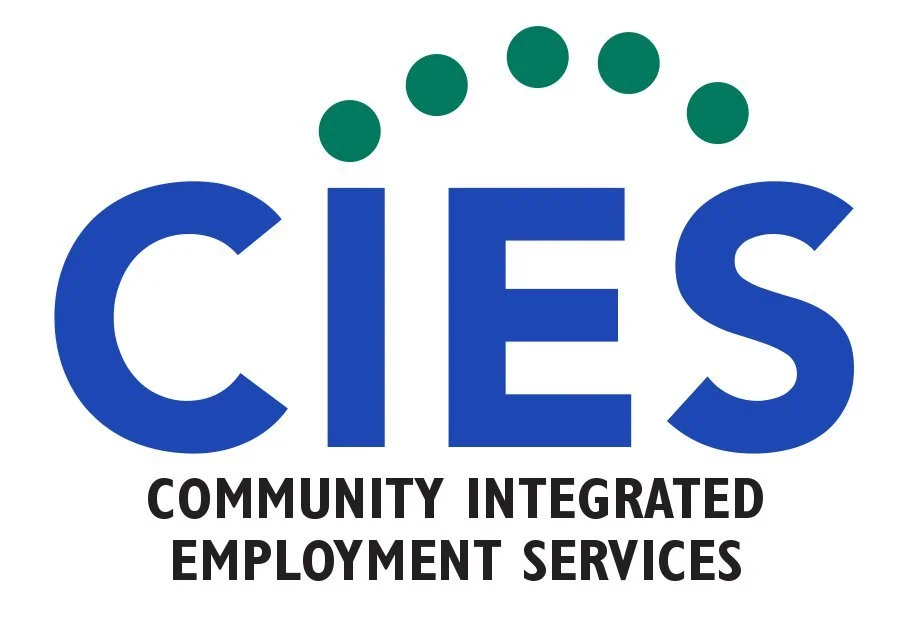 Logo for Community Integrated Employment Services (CIES) with large blue letters and green dots above, and black text below.
