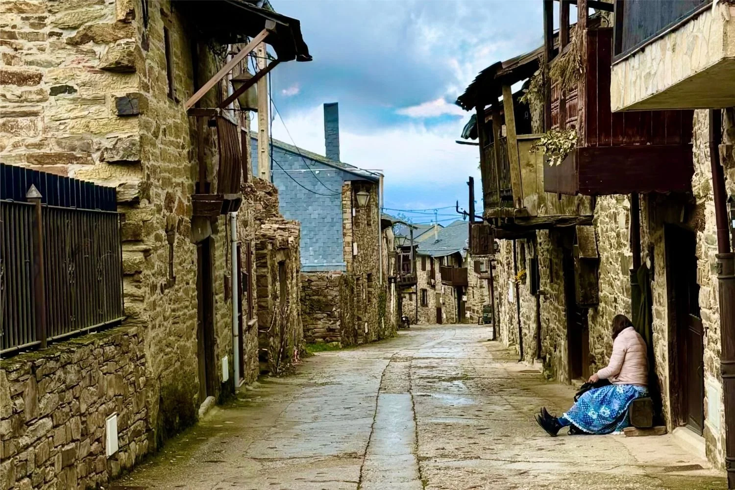 Camino Francés Pilgrim Resting in Village