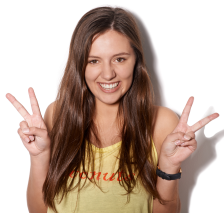 happy woman throwing up double peace signs