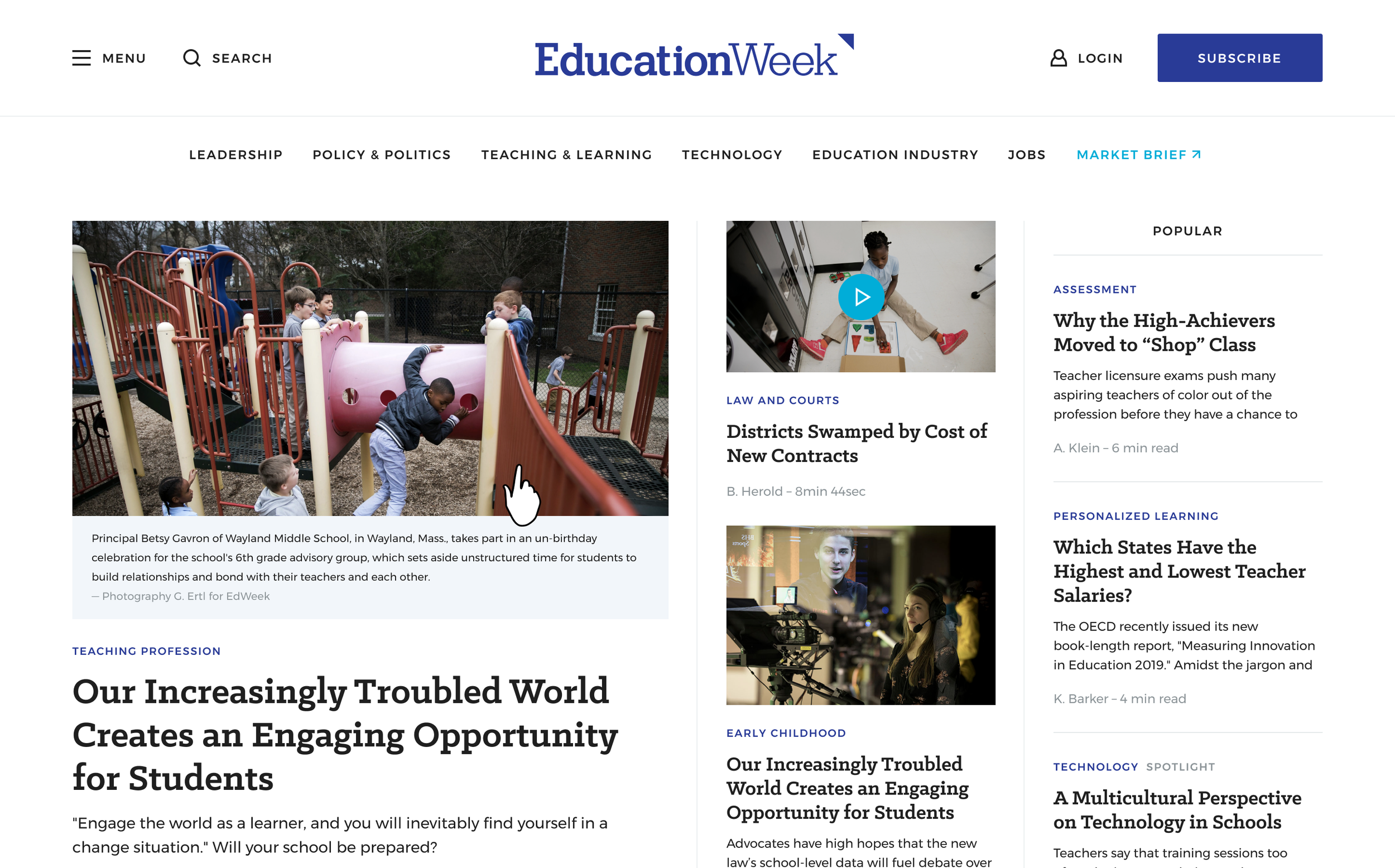 Children playing on a playground structure outdoors with slides and tunnels, supervised by an adult in the background.