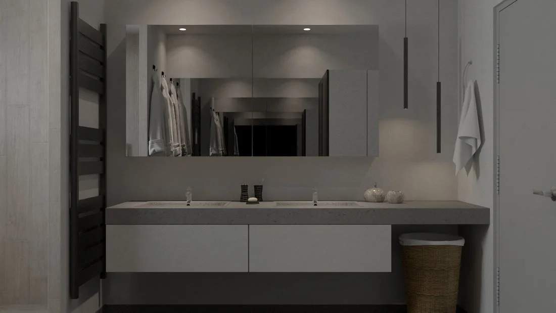 Rénovation haut de gamme d'une maison à Charnay avec une salle de bain avec miroir au-dessus d'un lavabo gris, décorée avec des vases et des serviettes blanches suspendues à une barre, avec des luminaires suspendus à droite.