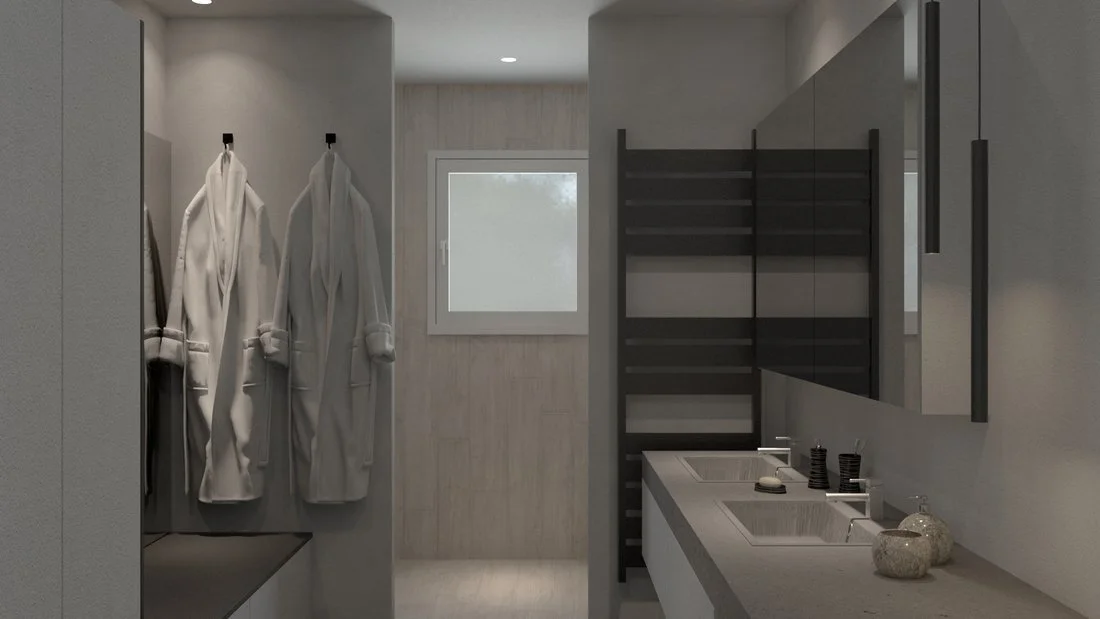 Rénovation haut de gamme d'une maison à Charnay avec une salle de bain dans des tons bruts, béton ciré gris clair, agencement sur mesures avec colonnes de rangement et banc, grande douche à l'italienne.