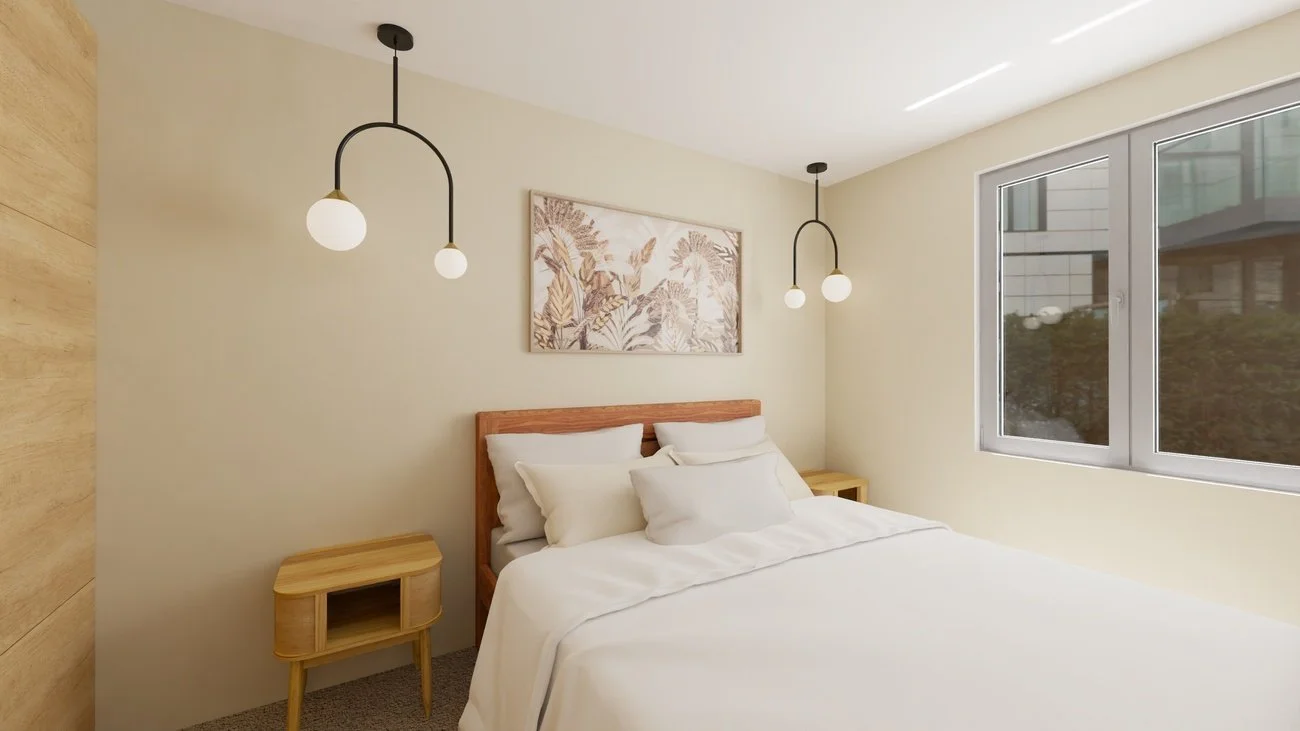 Rénovation haut de gamme d'un appartement à Valdahon avec chambre avec lit blanc, cadres de décoration murale, fenêtres, et lampes suspendues. Agencement sur mesures.