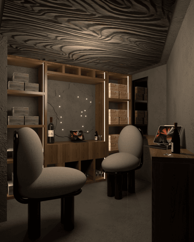 Une petite cave à vin avec deux fauteuils, une table en bois, des étagères remplies de caisses de vin, une carte de la France. Appartement haut de gamme rénové selon le thème du vin à Neuilly sur Seine.