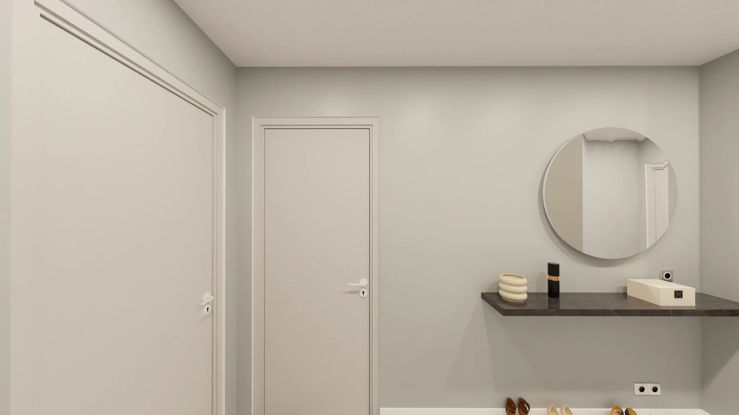 Rénovation d'un appartement en Moldavie avec entrée avec murs gris clair, portes blanches, miroir rond au mur, console noire avec décorations, tapis blanc, chaussures, et éléments décoratifs en beige et noir. Agencement haut de gamme sur mesures.