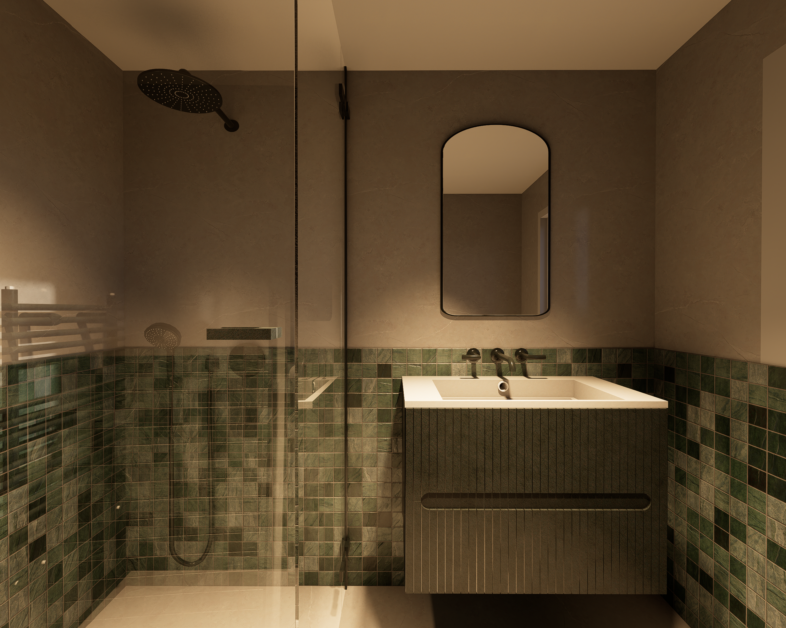 Rénovation haut de gamme d'une villa à Chelles avec salle de bain avec douche à l'italienne, pomme de douche ronde noire, miroir oval. Murs en pierre ou carrelage beige, partie inférieure en carreaux verts, lavabo blanc avec robinet en métal.