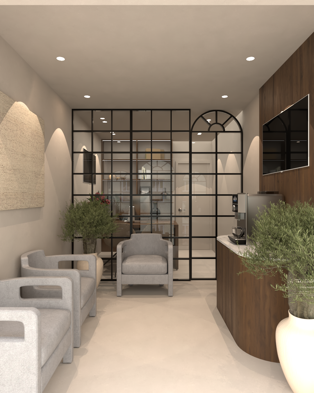Rénovation haut de gamme d'un bureau au Maroc avec une table en bois, deux chaises en tissu beige, une chaise de bureau noire et blanche, canapés gris, plantes en pot, une machine à café, cloison en métal noir et télévision murale.