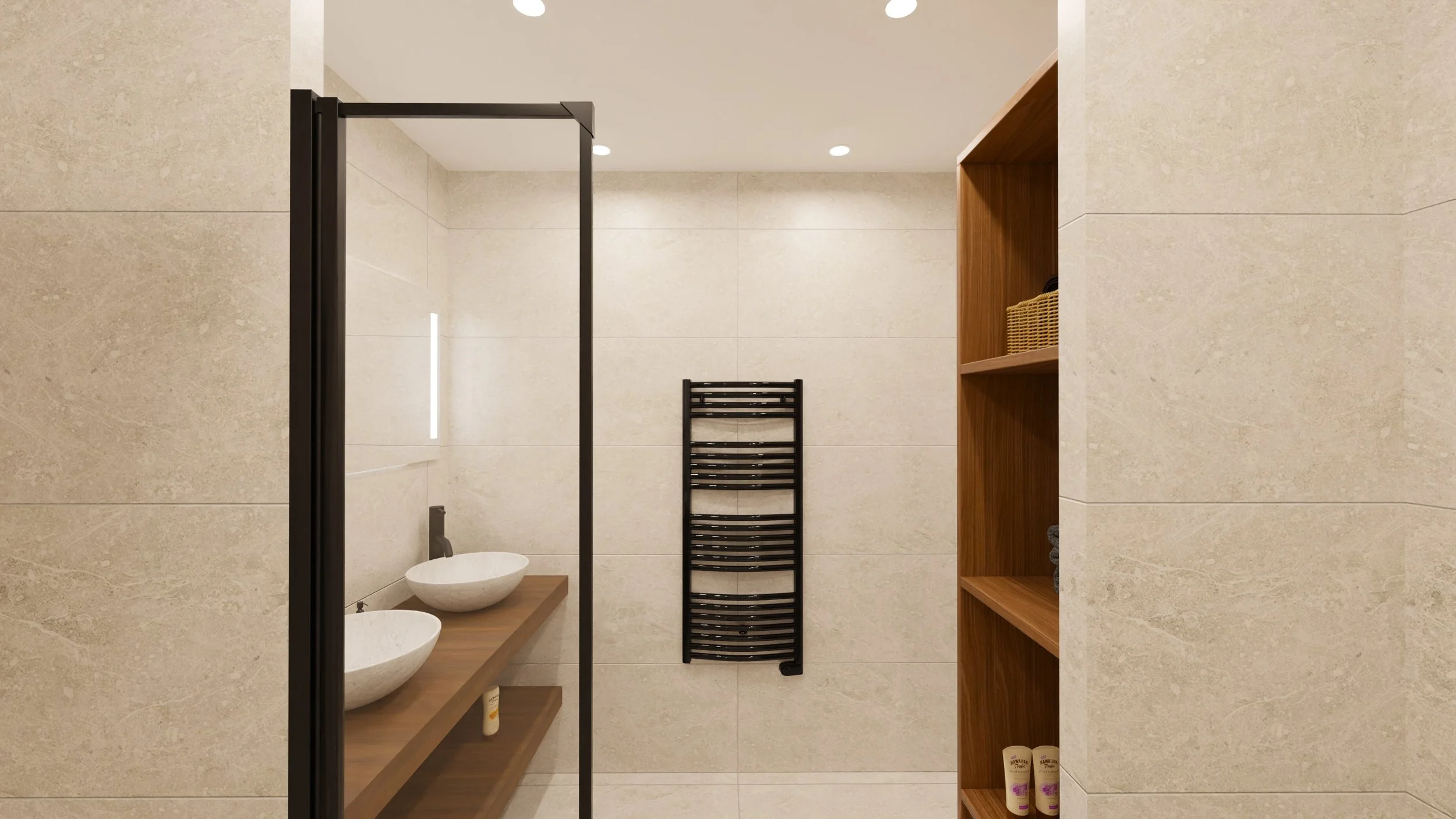 Rénovation haut de gamme d'un appartement avec salle de bain moderne avec des murs en pierre claire, une douche à l'italienne avec un plafond de douche noir, deux vasques rondes sur un meuble en bois, et un radiateur noir. Agencement sur mesures