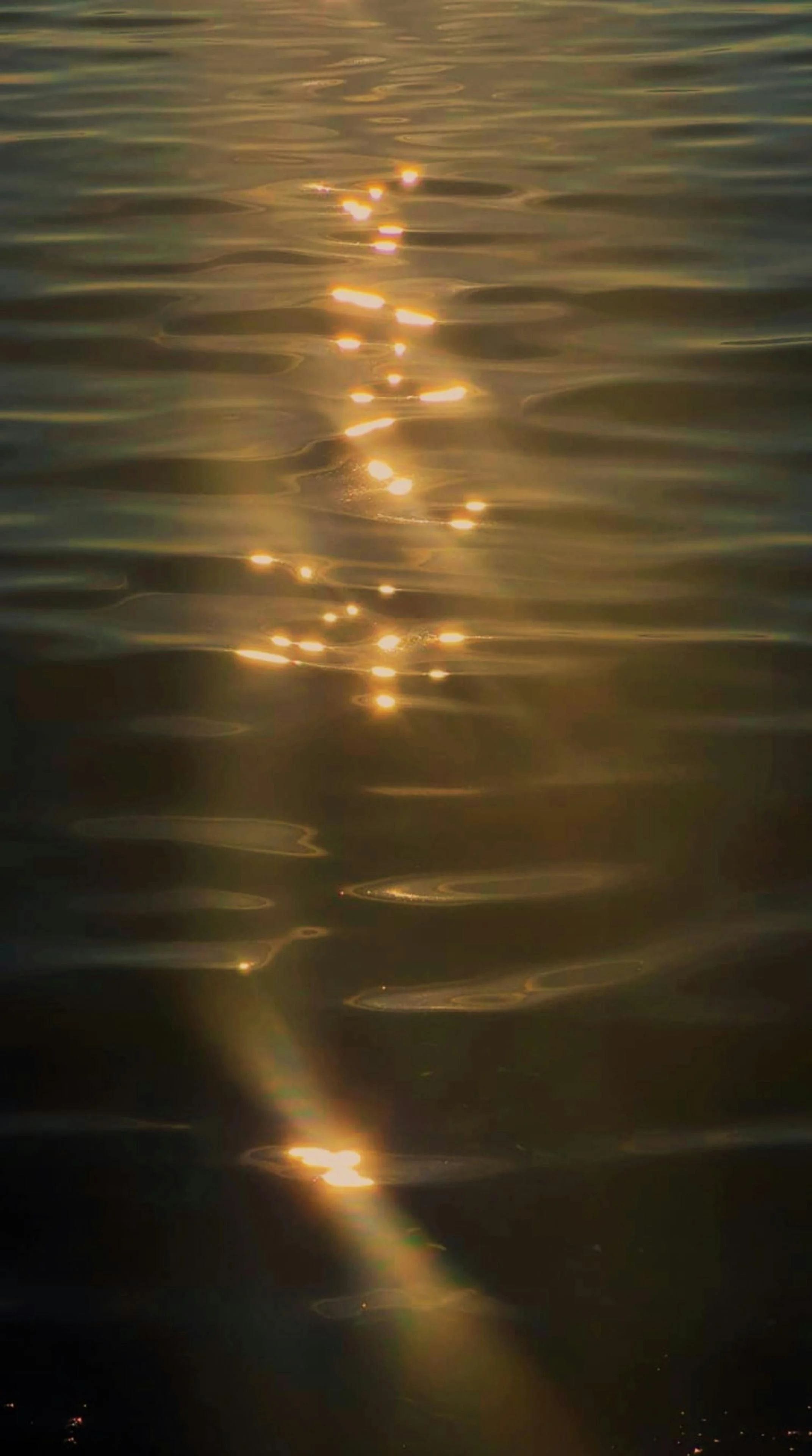 An abstract pattern of warm, golden light ripples, visually representing the silent, somatic processing and internal release of stored trauma during Brainspotting therapy at Made Whole Counseling.