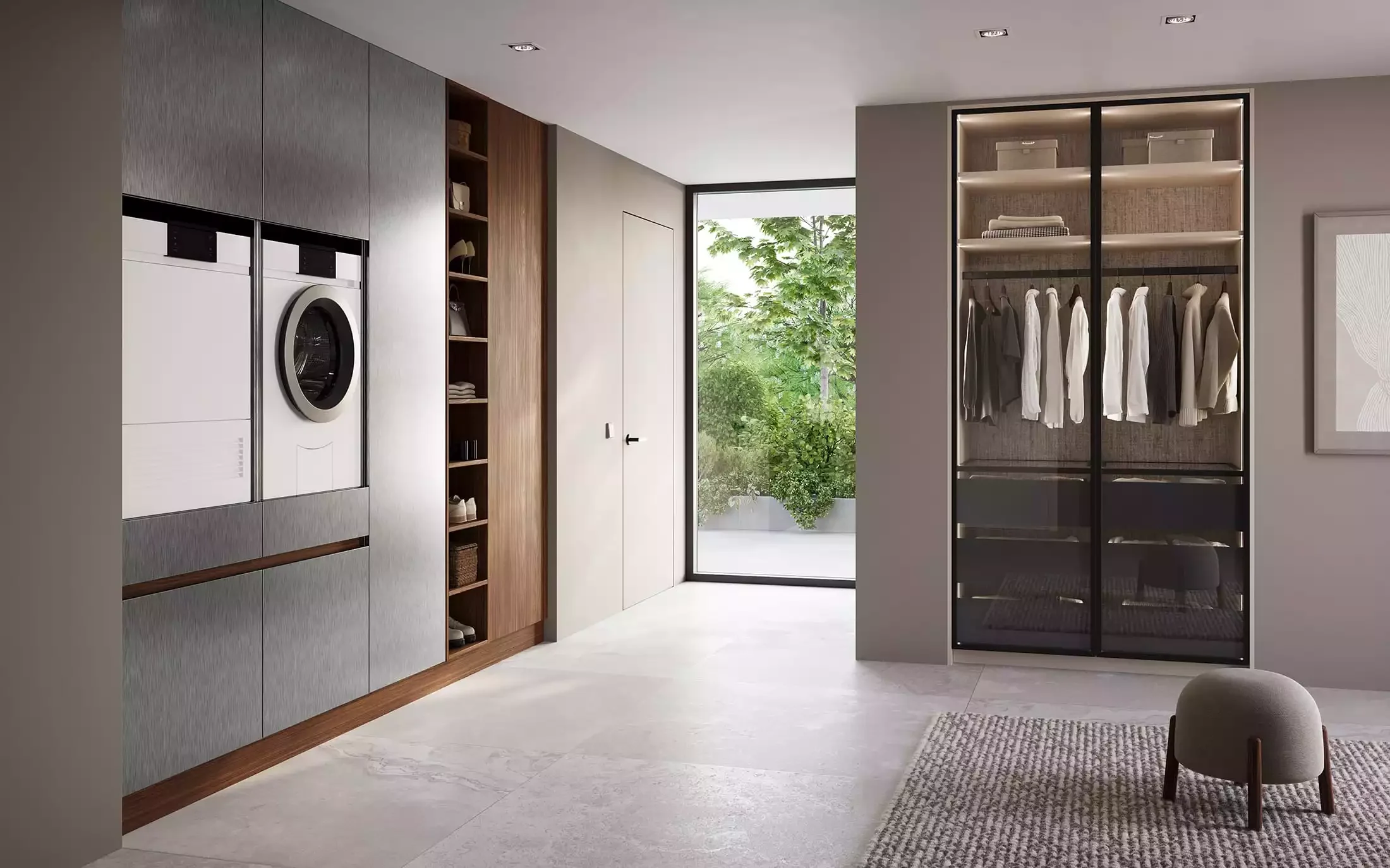 Modern laundry room with front-loading washer and dryer, open shelves with storage baskets, a closet with hanging clothes, and a large glass door leading to greenery outside.