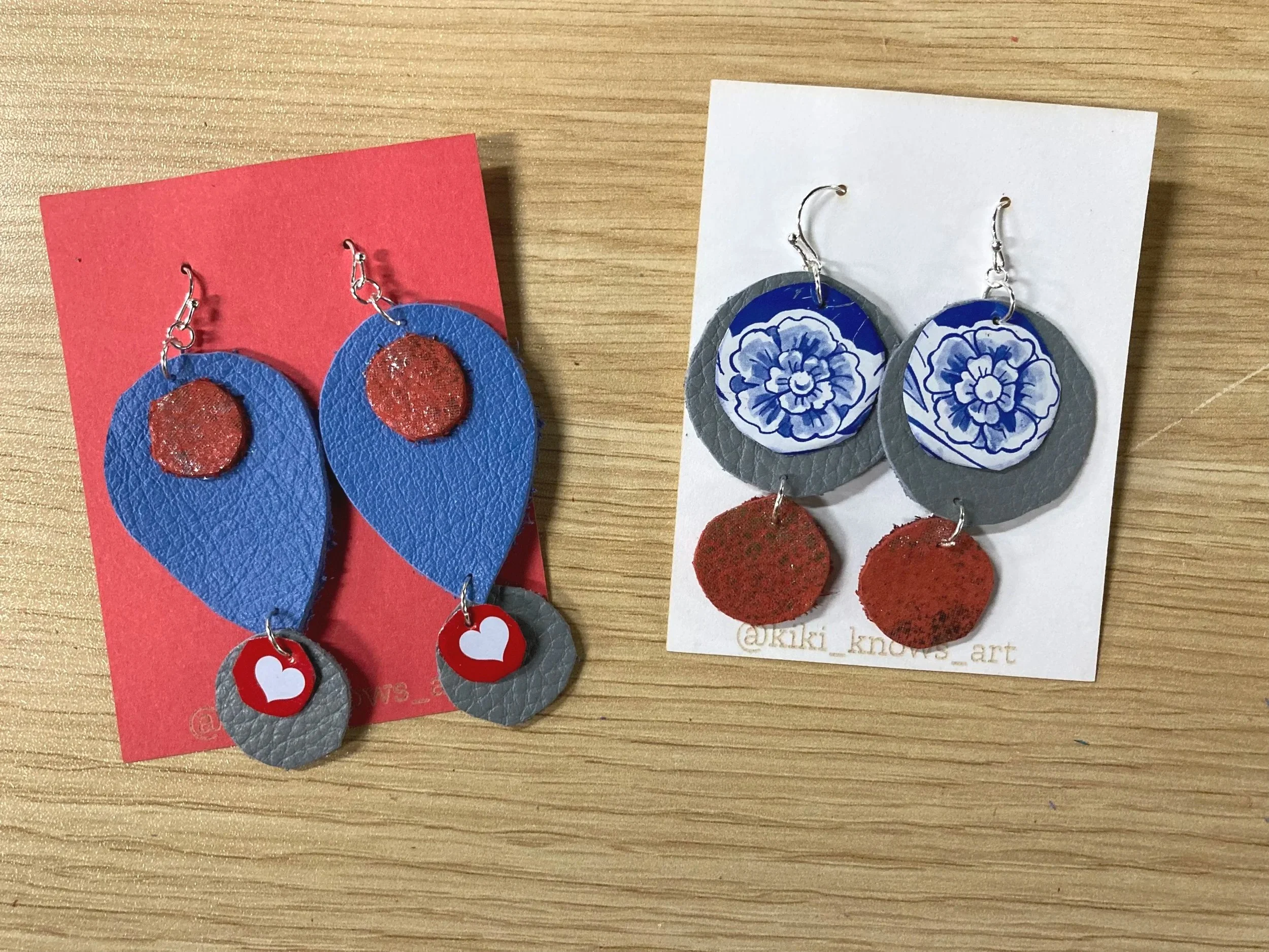 Two pairs of upcycled leather earrings made at a Kiki Knows Art workshop.
