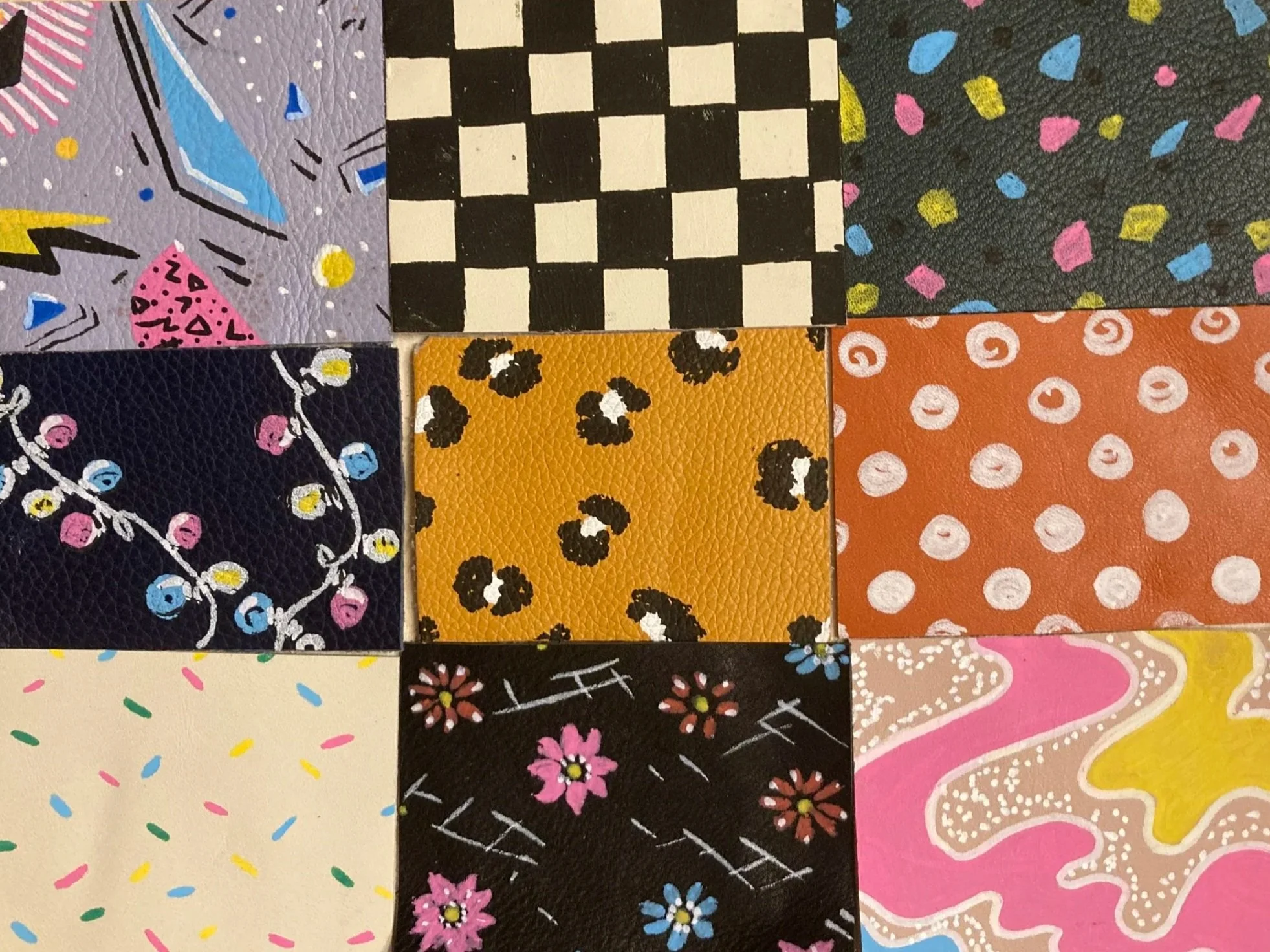 Colorful leather squares with different patterns for a Kiki Knows Art workshop.