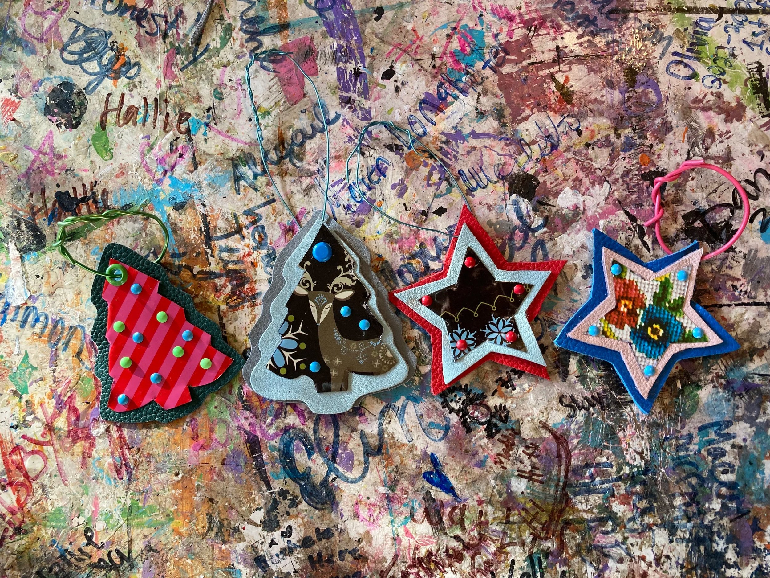 Handmade Christmas ornaments made from upcycled leather.