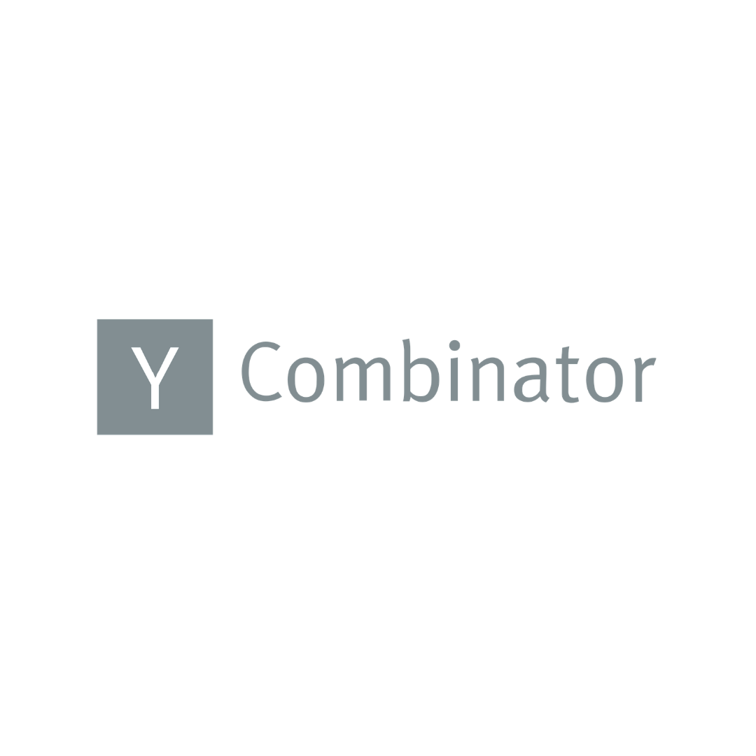 Y Combinator logo in gray.