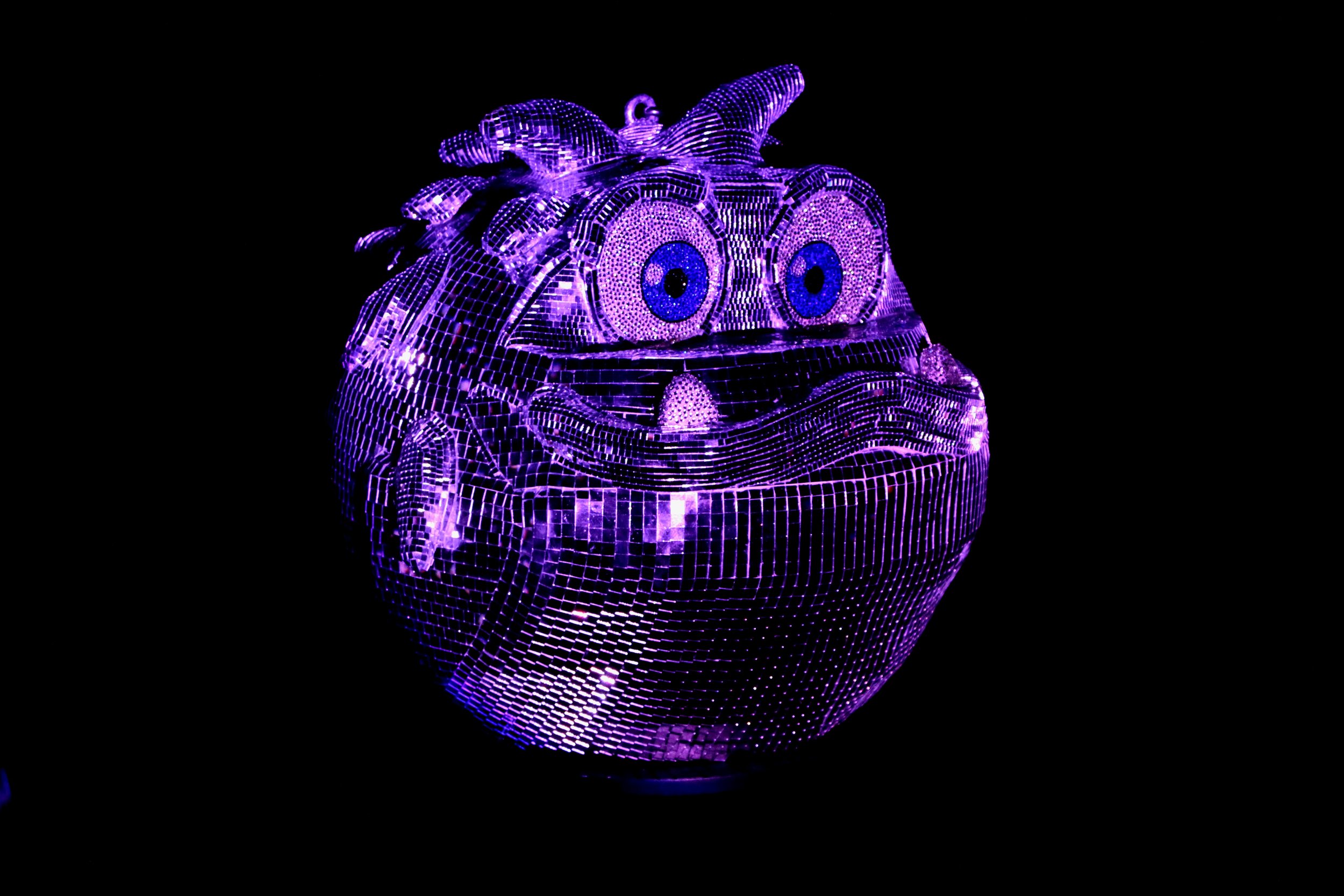A digital art piece of a jar with a purple neon glow, featuring large blue eyes and a smiling face.