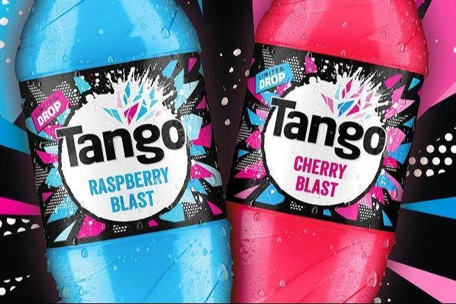 Two bottles of Tango soda, one Raspberry Blast flavor in blue and one Cherry Blast flavor in pink, against a colorful, dynamic background.