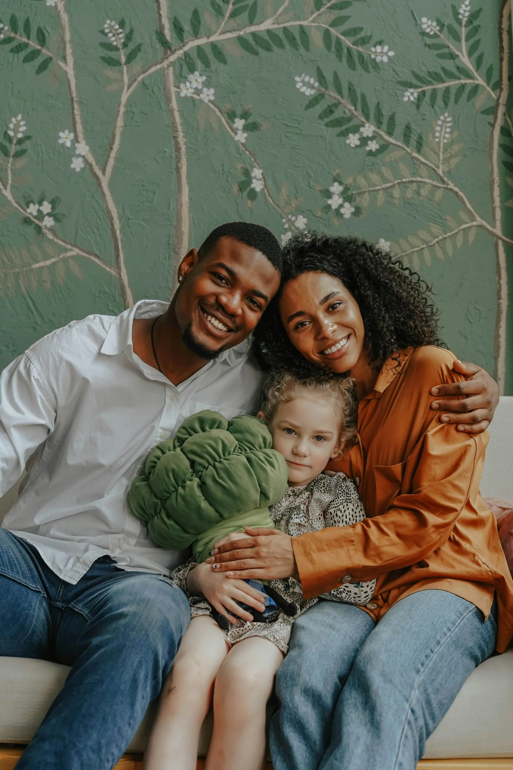 👨‍👩‍👧‍👦 Use the adoptive family portrait — warm, real, and relatable. Place this near your SKOOL community call to action to show the human face of your work. Search on Pexels.com: "adoptive family together"