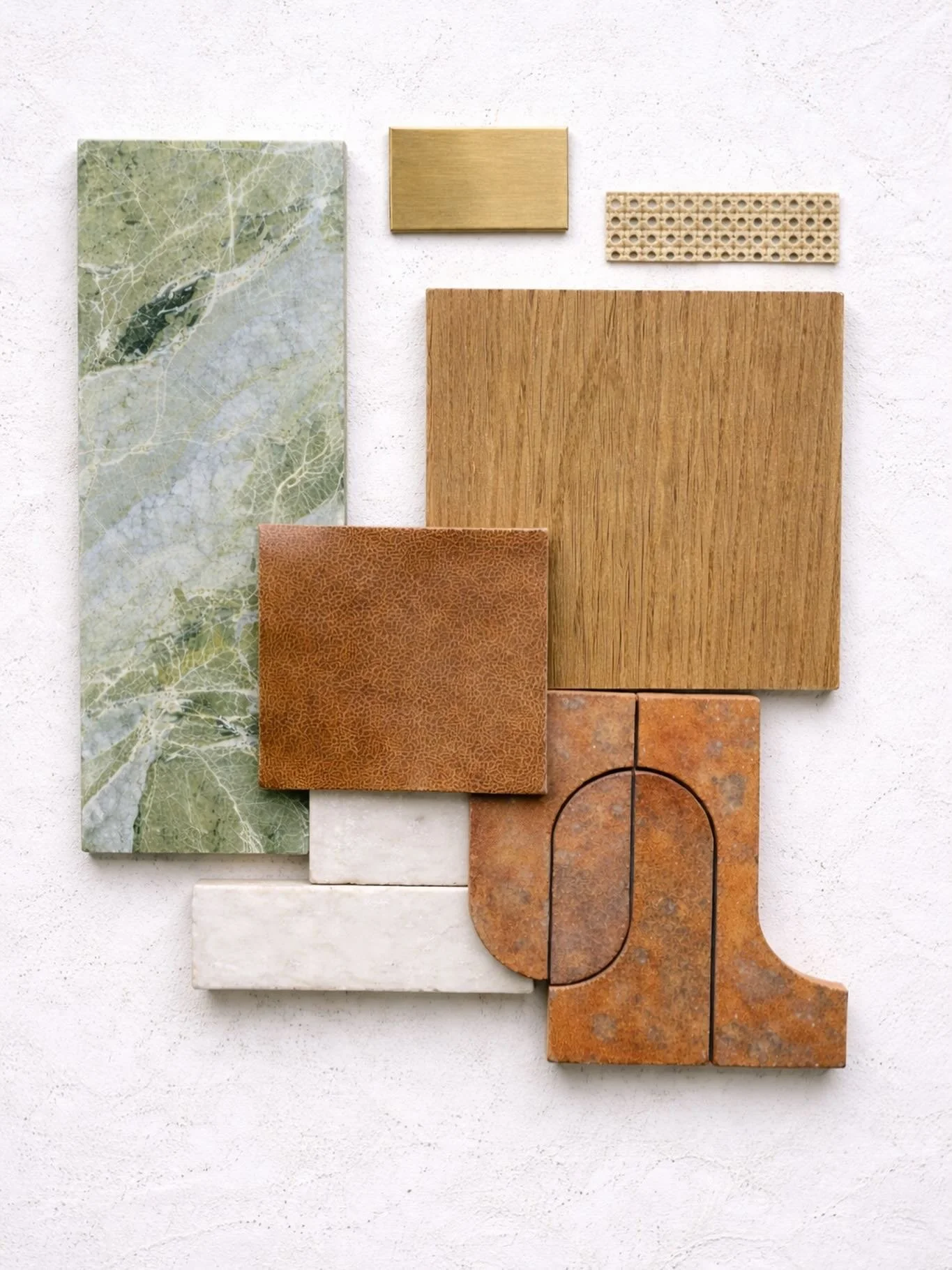 Material study in progress for a full kitchen gut renovation - building the palette from the ground up.
We&rsquo;re layering honed green marble for depth, warm rift-cut oak for structure, and saddle leather to soften the composition. Handmade zellige