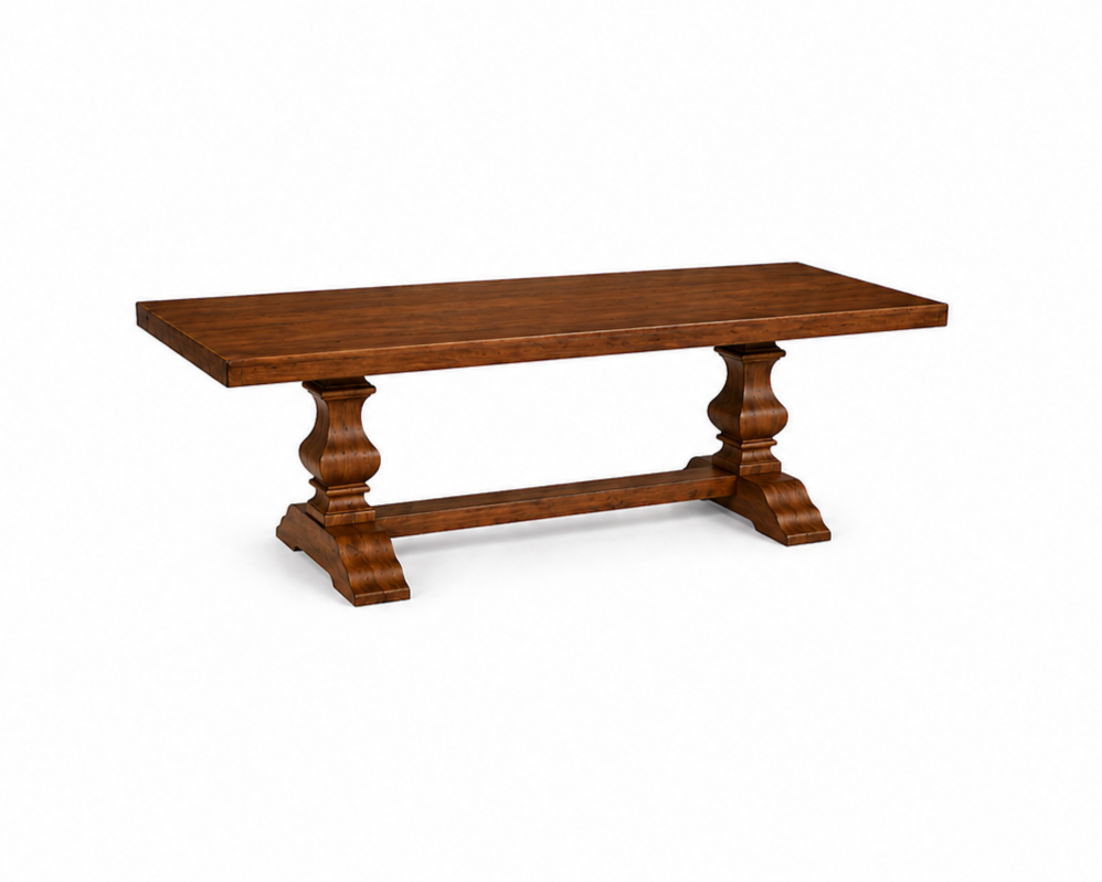 Wooden dining table with a rectangular top and ornate pedestal legs
