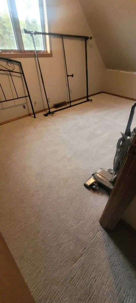 Bedroom with newly installed light beige wall-to-wall carpet
