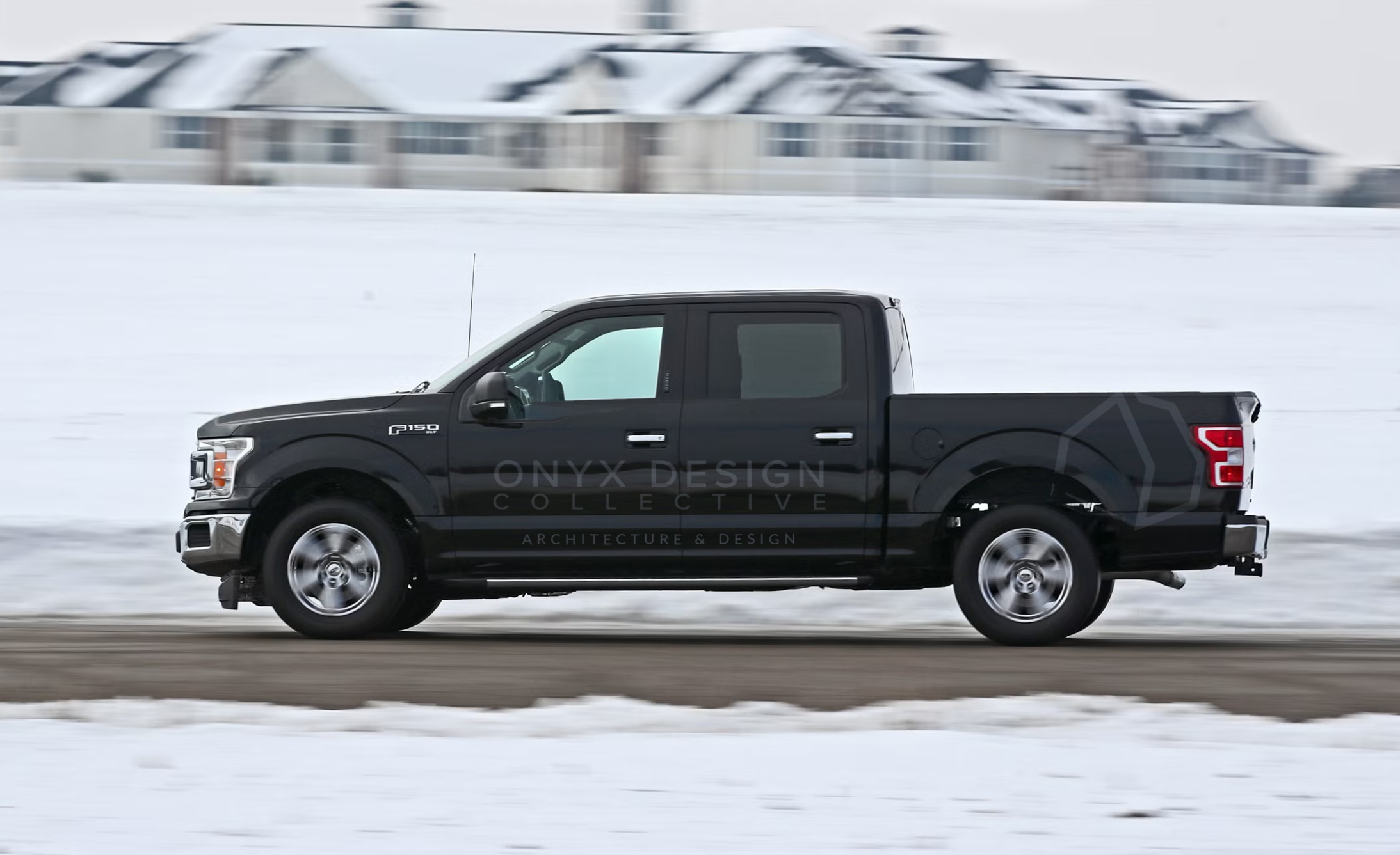 A black Ford F-150 pickup truck driving on a snowy road during winter with houses visible in the background.