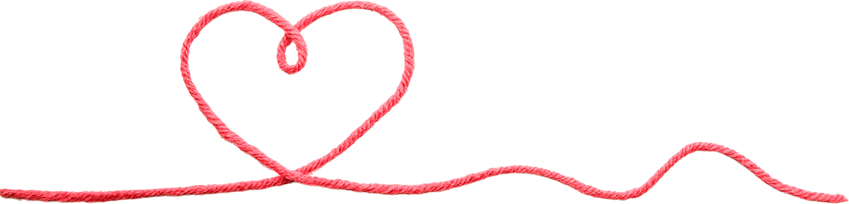 Pink string shaped into a heart with the string extending horizontally.