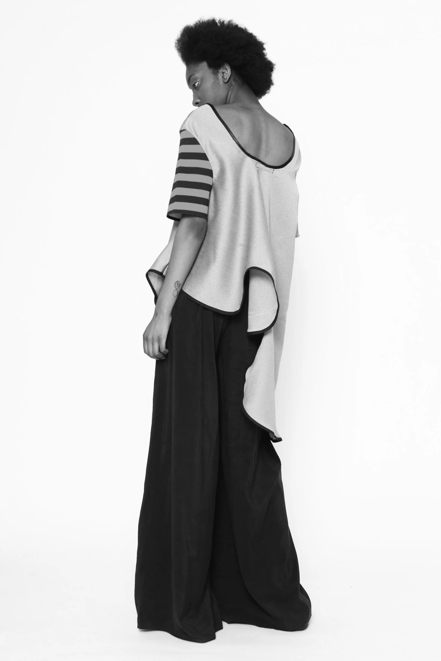 Zara Saberi — Cotton fashion piece exploring the relationship between body and line.