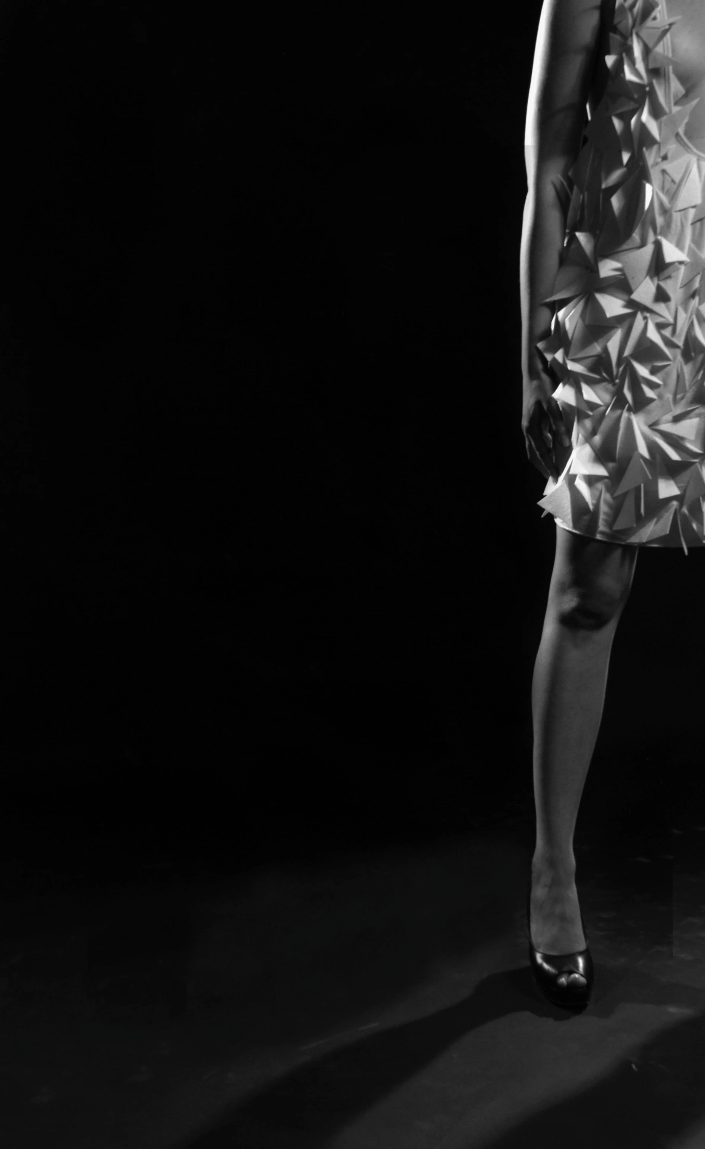 Zara Saberi — Structural fashion design from the Triangles project, handcrafted from recycled tulle and textile remnants in Italy.