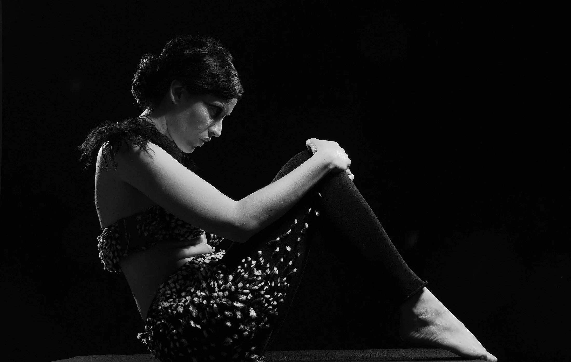Model wearing the Beneath the Surface collection by Zara Saberi, created in Italy through experimental textile design.