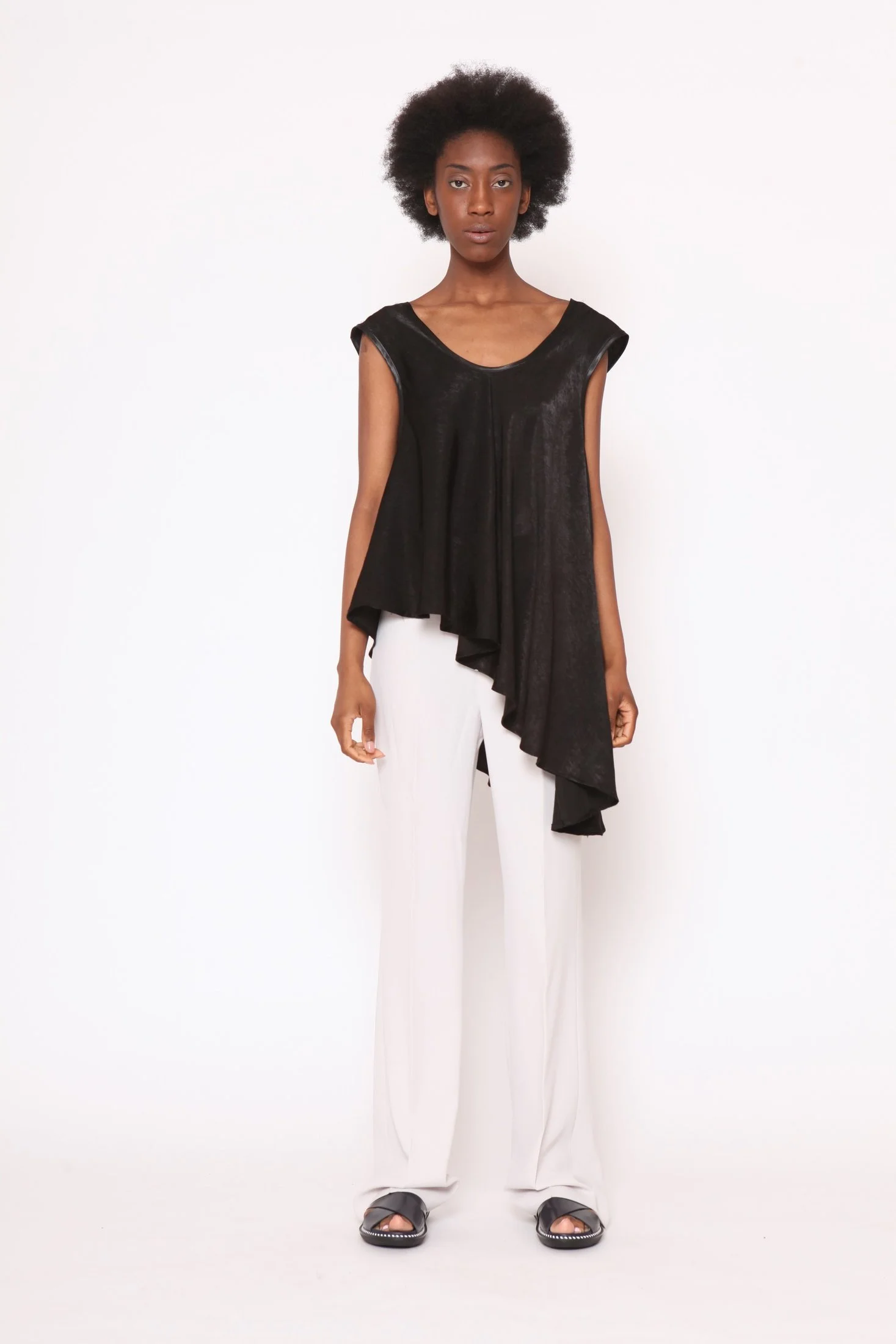 Zara Saberi — Minimal silhouette where fashion and drawing become one composition.