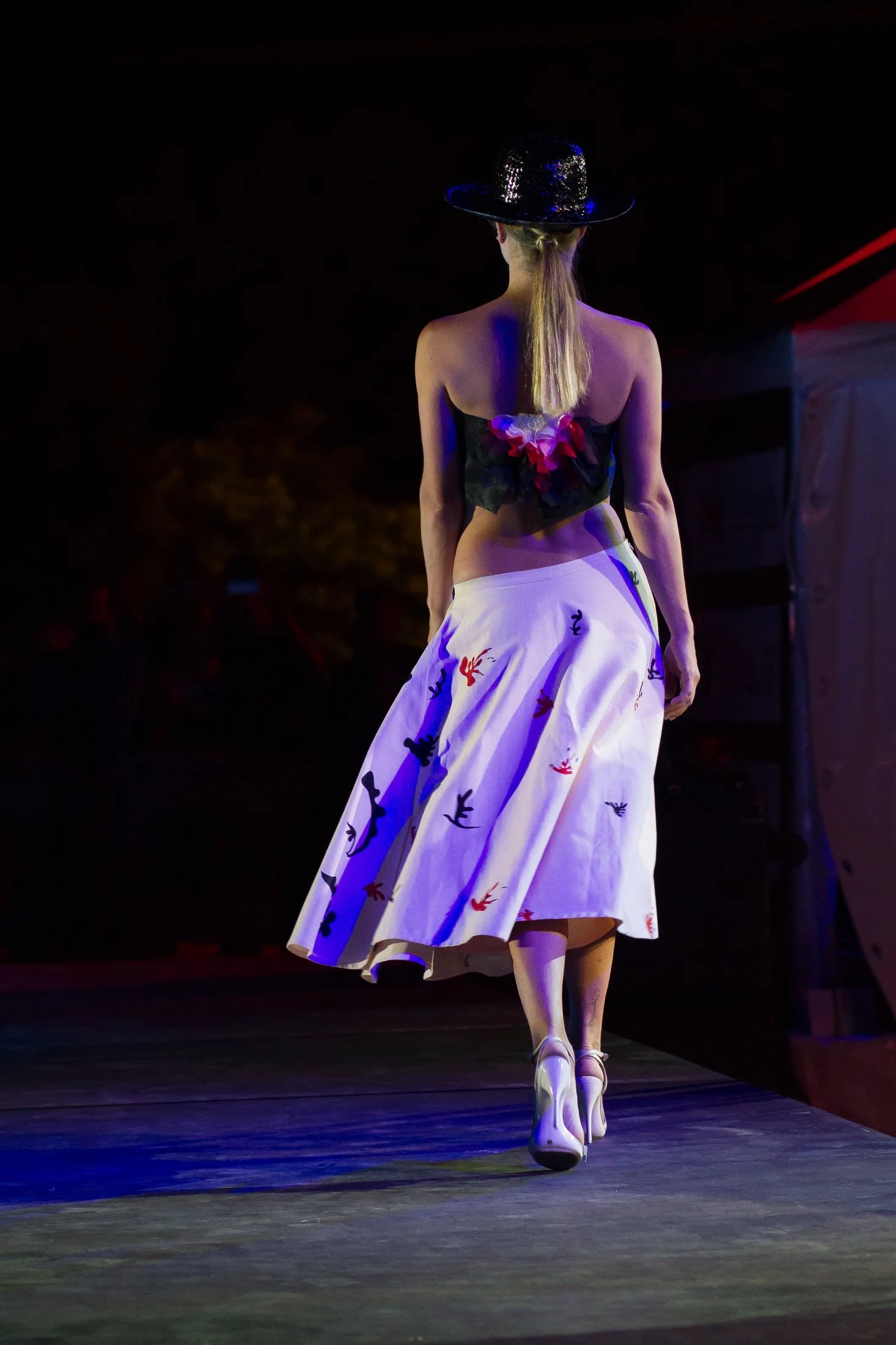 Zara Saberi — Simple Line runway look, structured silhouette, Rome Italy