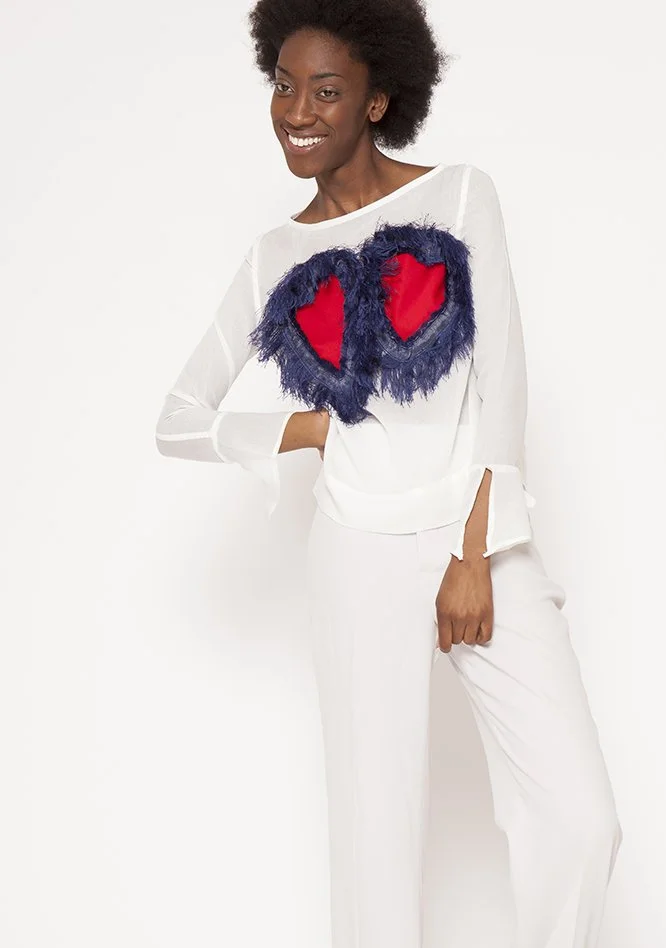 Zara Saberi — Contemporary wearable art emphasizing slow craftsmanship and layered textiles.