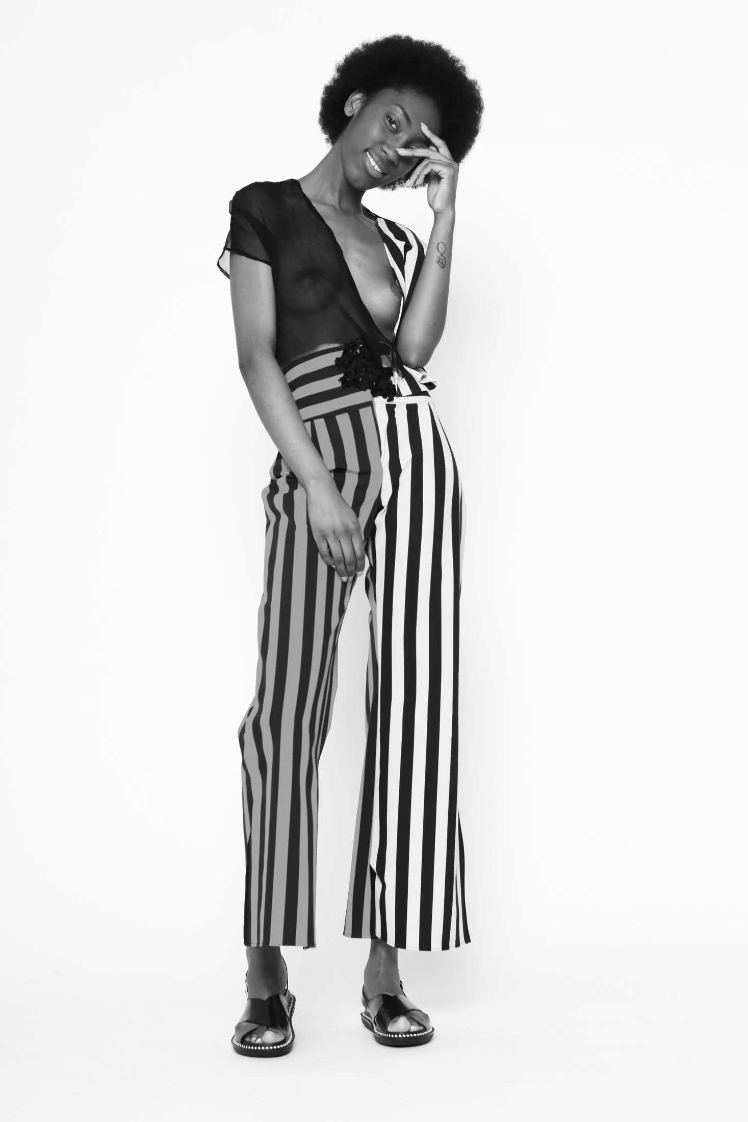 Zara Saberi — Minimal garment where structure becomes the central design element.