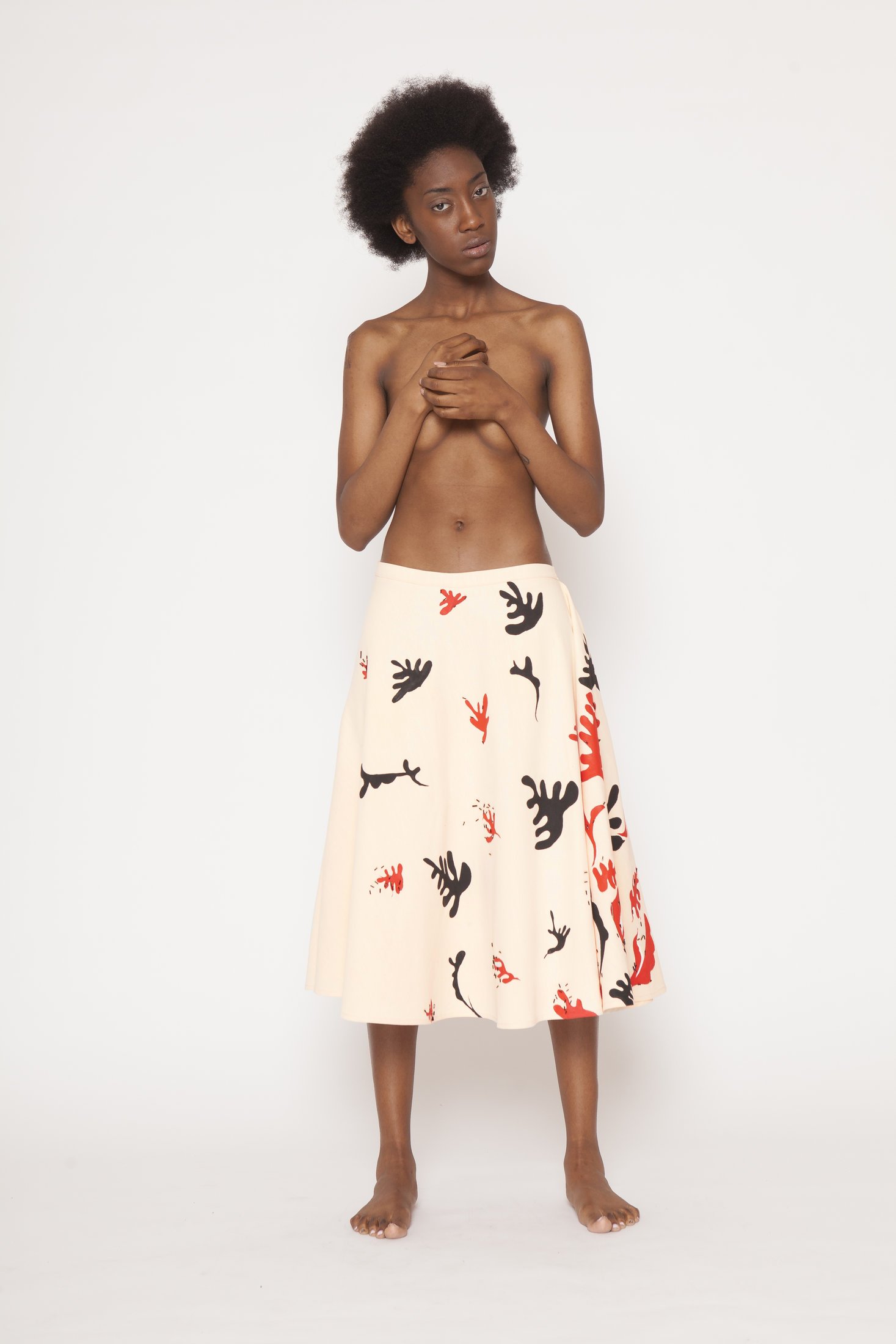 Zara Saberi — Hand-painted textile surface from the Beyond Ornament wearable art project.