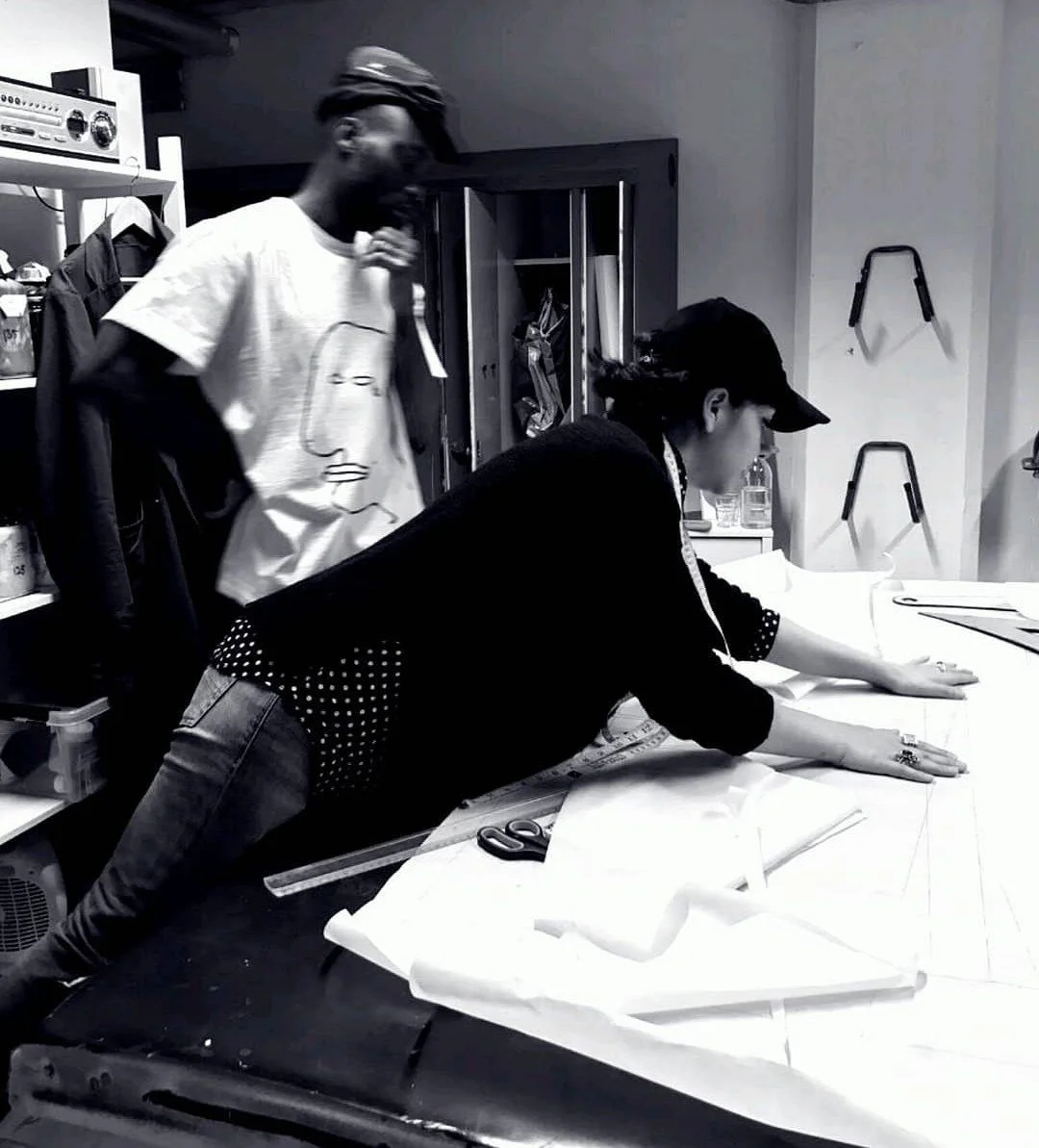 Zara Saberi developing garment patterns in the studio through fashion and textile design.