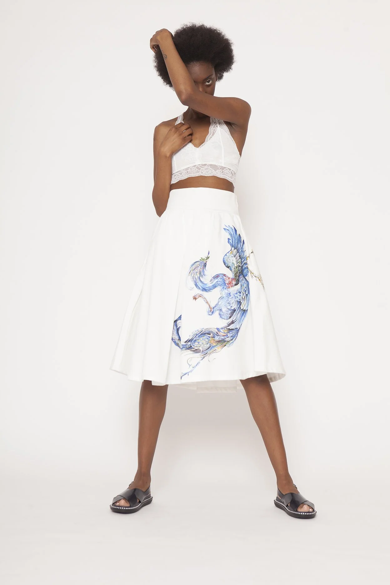 Zara Saberi — Guipure lace and painted textile brought together in a handcrafted garment.