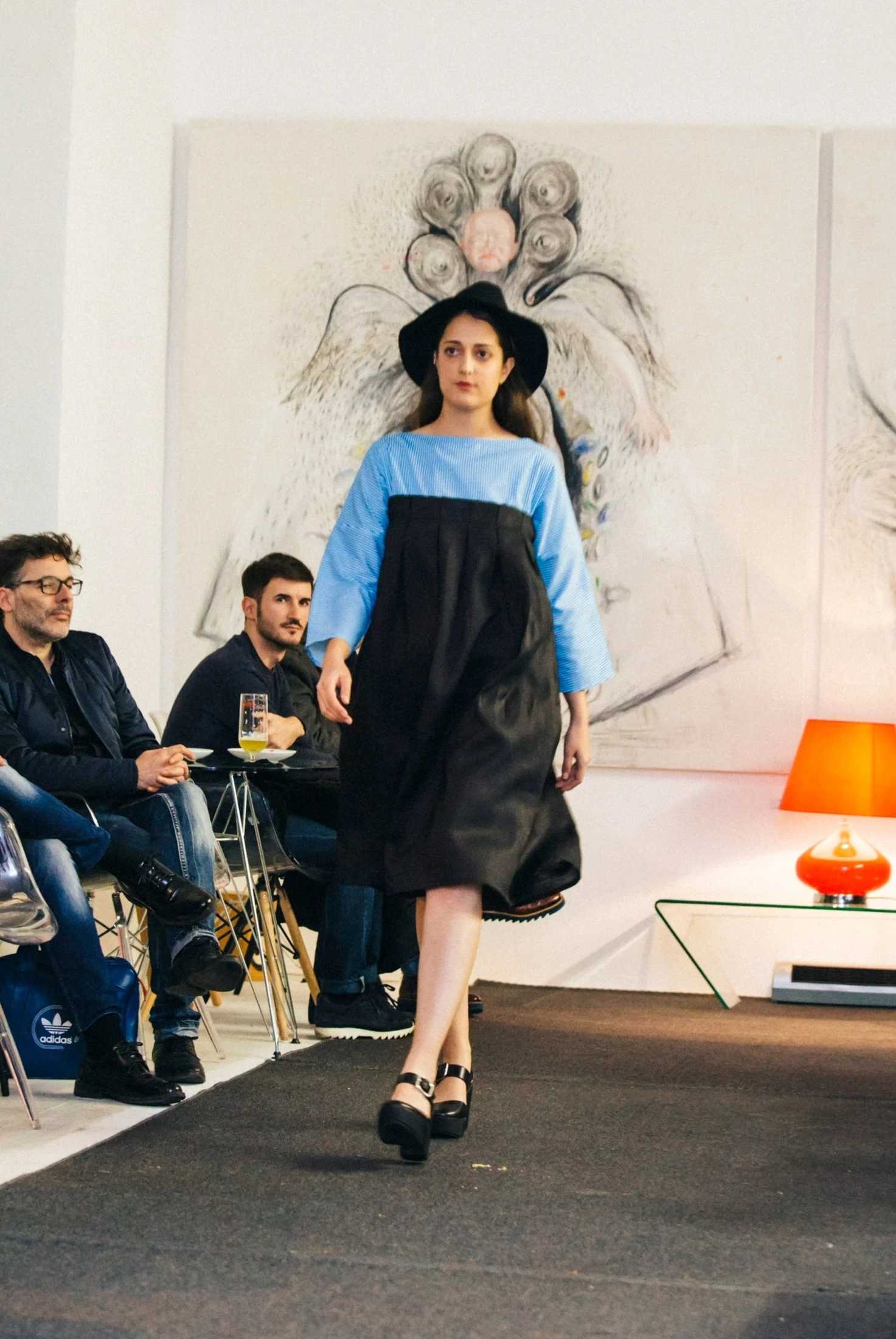 Zara Saberi — Model walking the runway wearing the Simple Line collection, Madrid, Spain, 2016.
