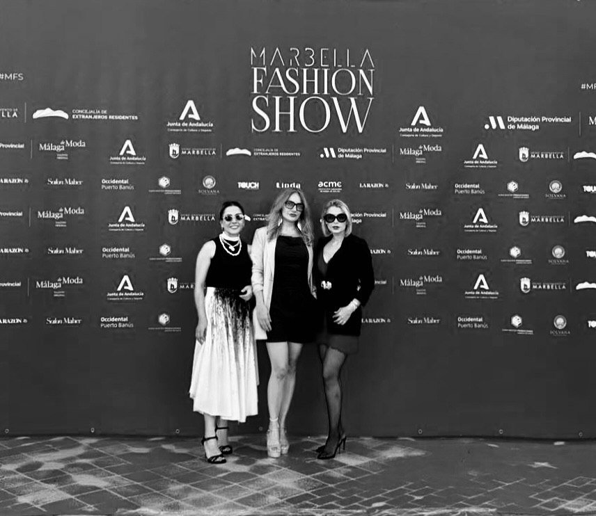 Zara Saberi capturing creative moments in motion during international fashion events.